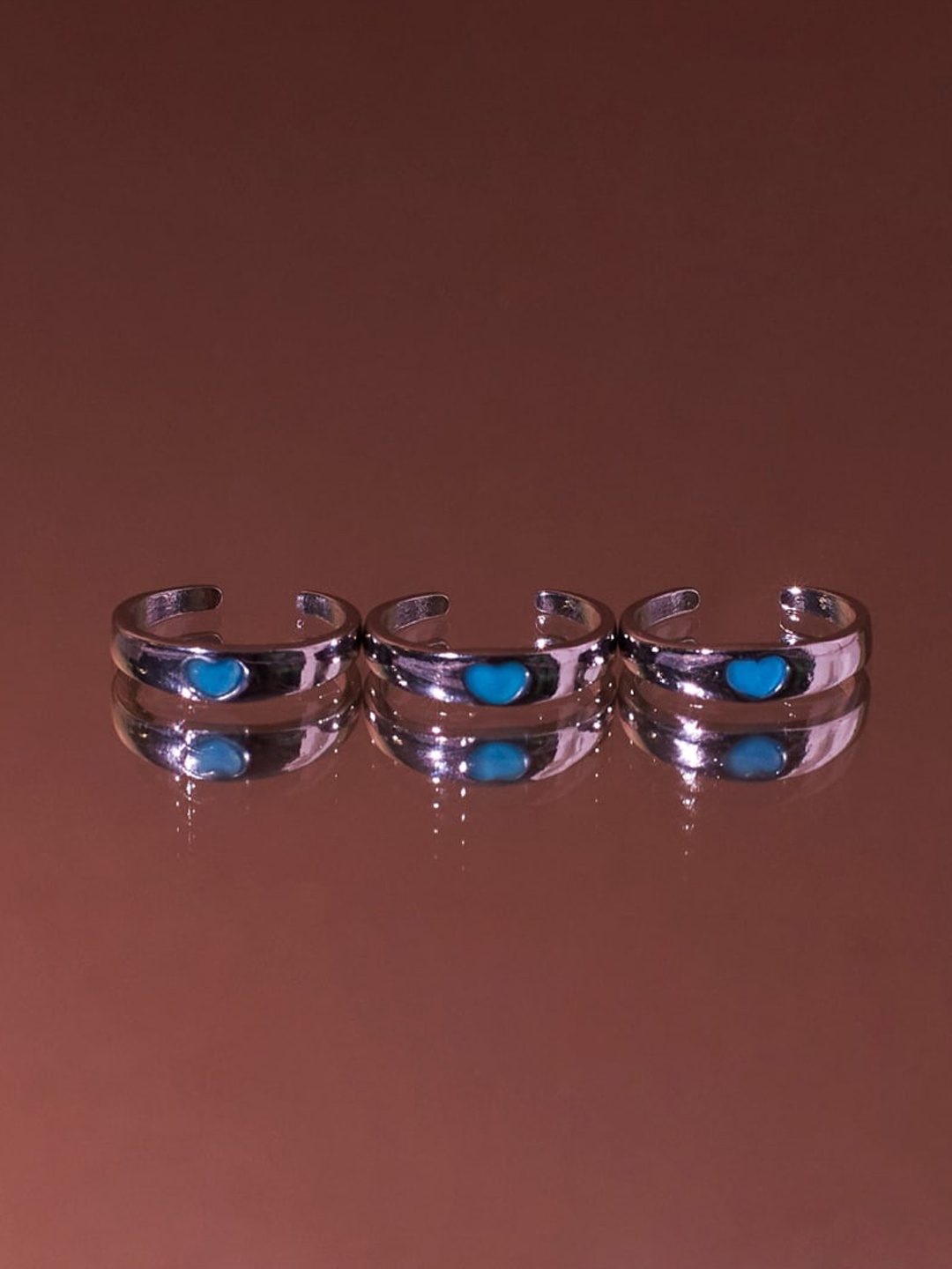 

DressBerry Silver Toned & Blue Heart Charm Copper Ring