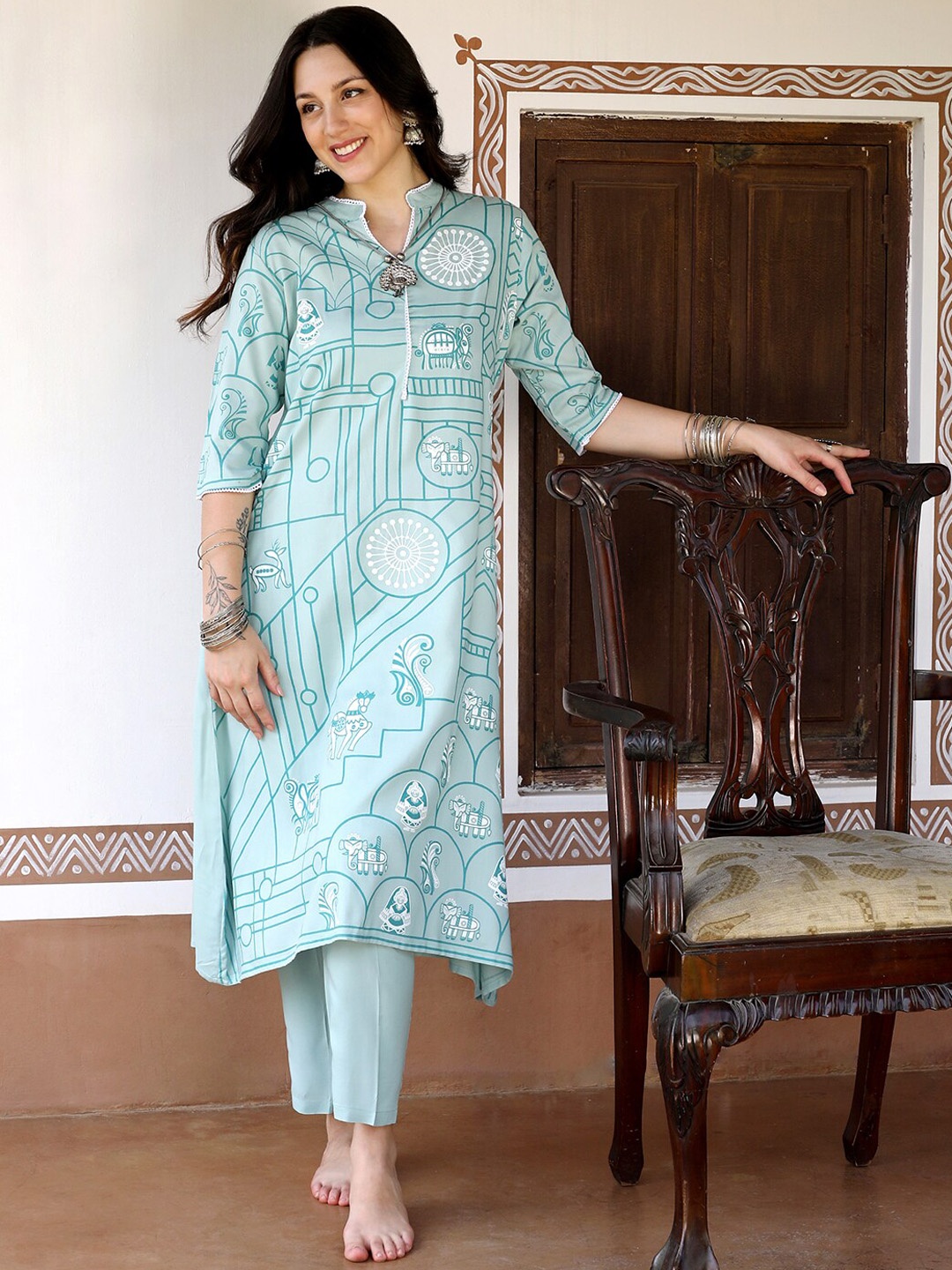 

QISSA Ethnic Motifs Printed Regular Kurta with Palazzos, Sea green