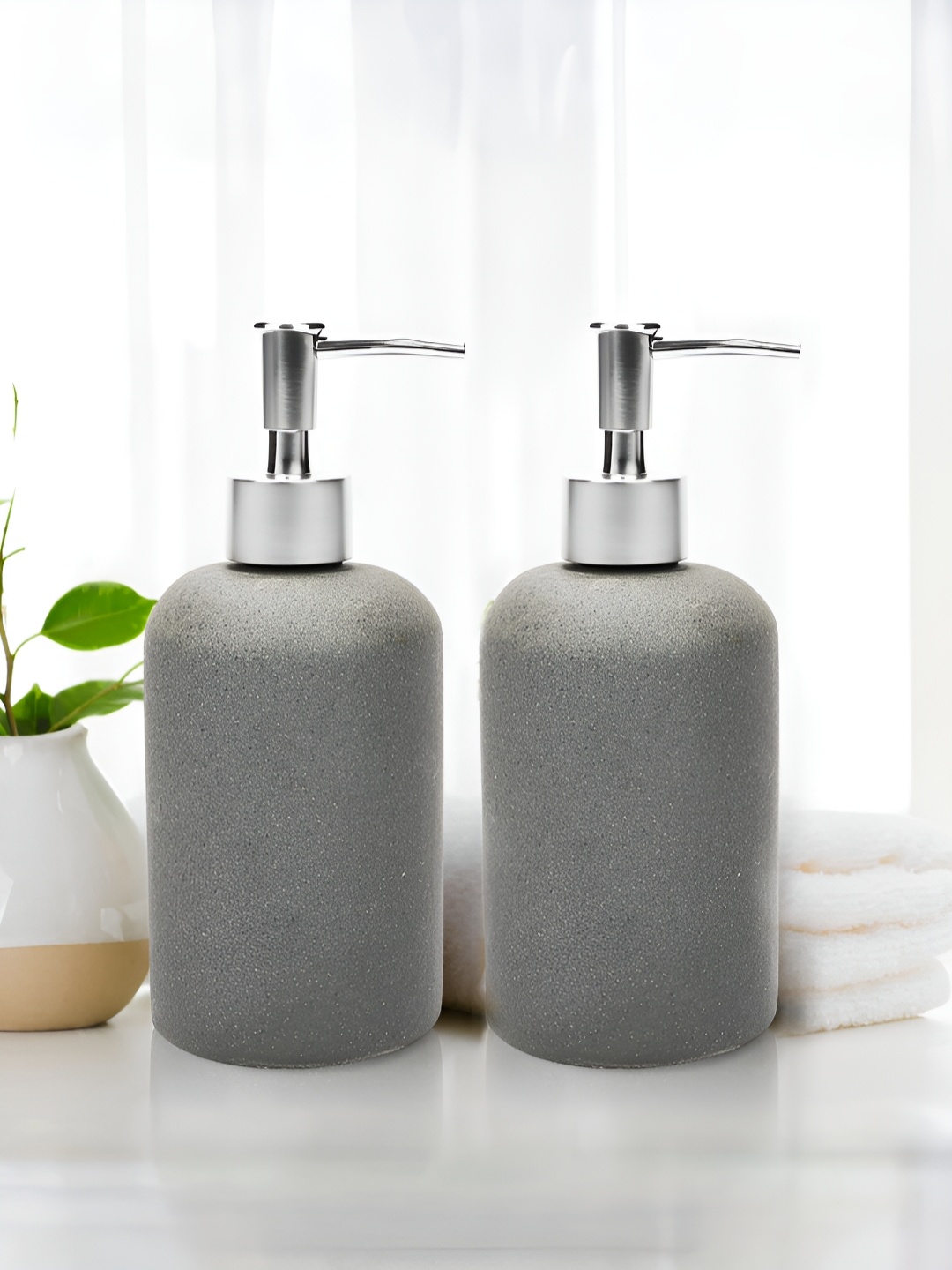 

Anko Grey 2 Piece Solid Ceramic Soap Dispenser