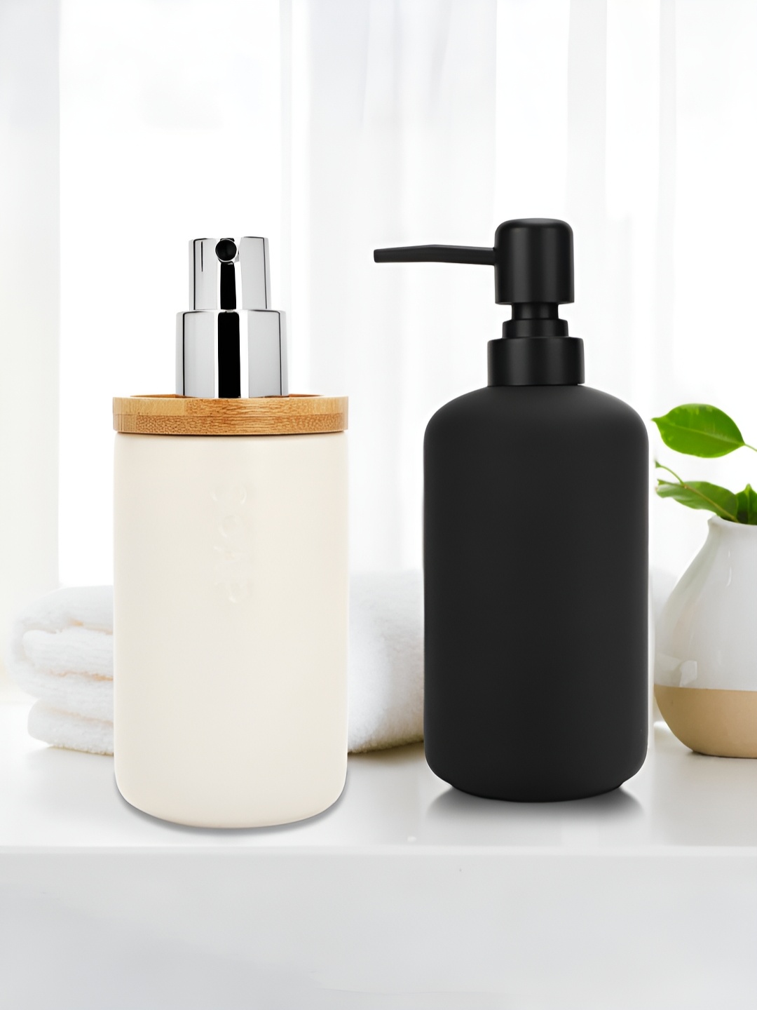 

Anko Black & White 2 Piece Solid Ceramic Soap Dispenser