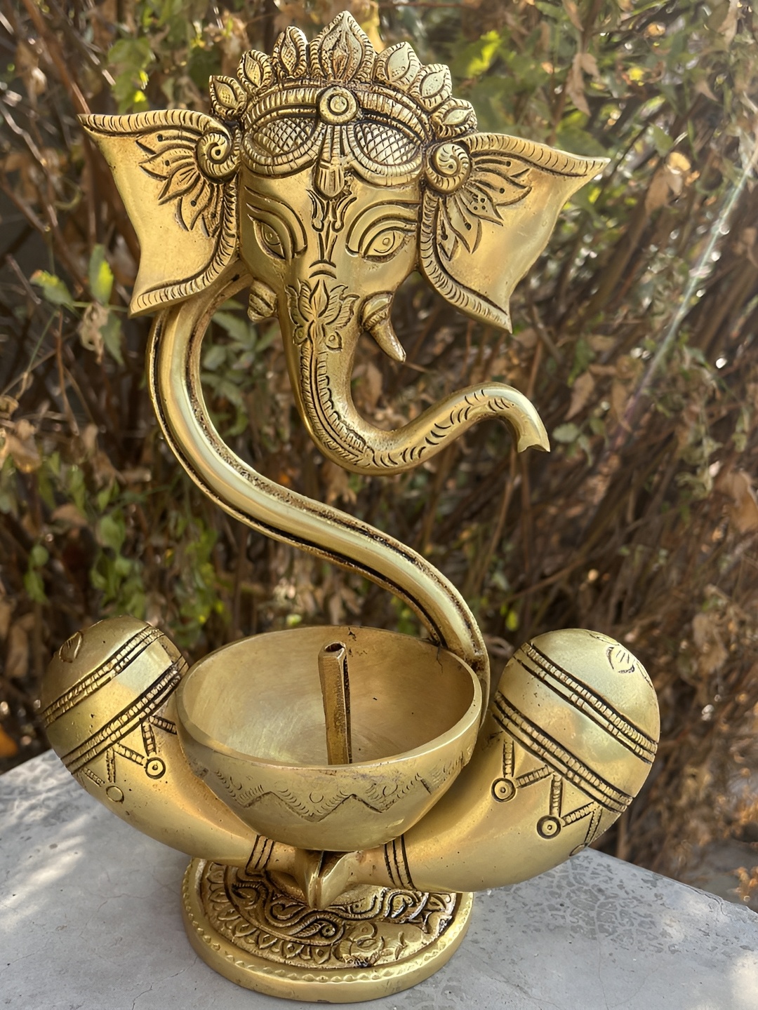 

Aakrati Brass Ganesh Statue With Akhand Diya, Gold
