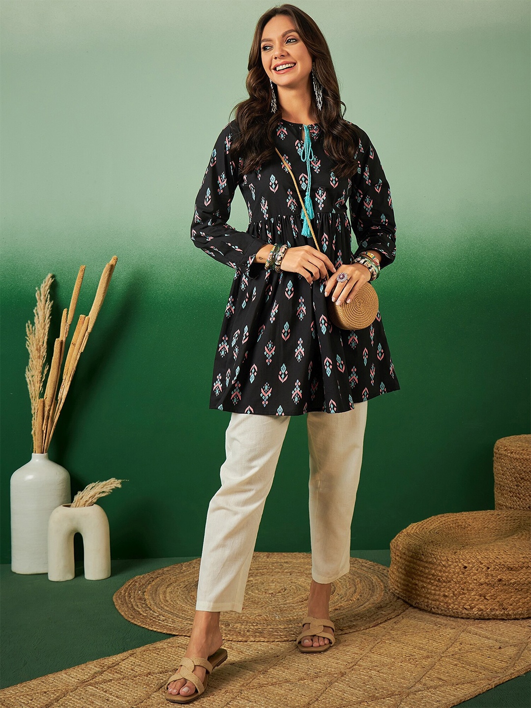 

Sangria Ethnic Motifs Printed Pure Cotton A-Line Kurti, Black