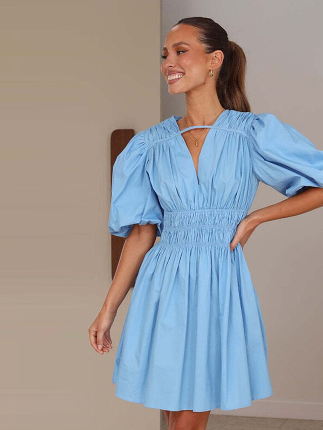 

StyleCast x Revolte Blue Puff Sleeves V-Neck Smocked Fit & Flare Dress