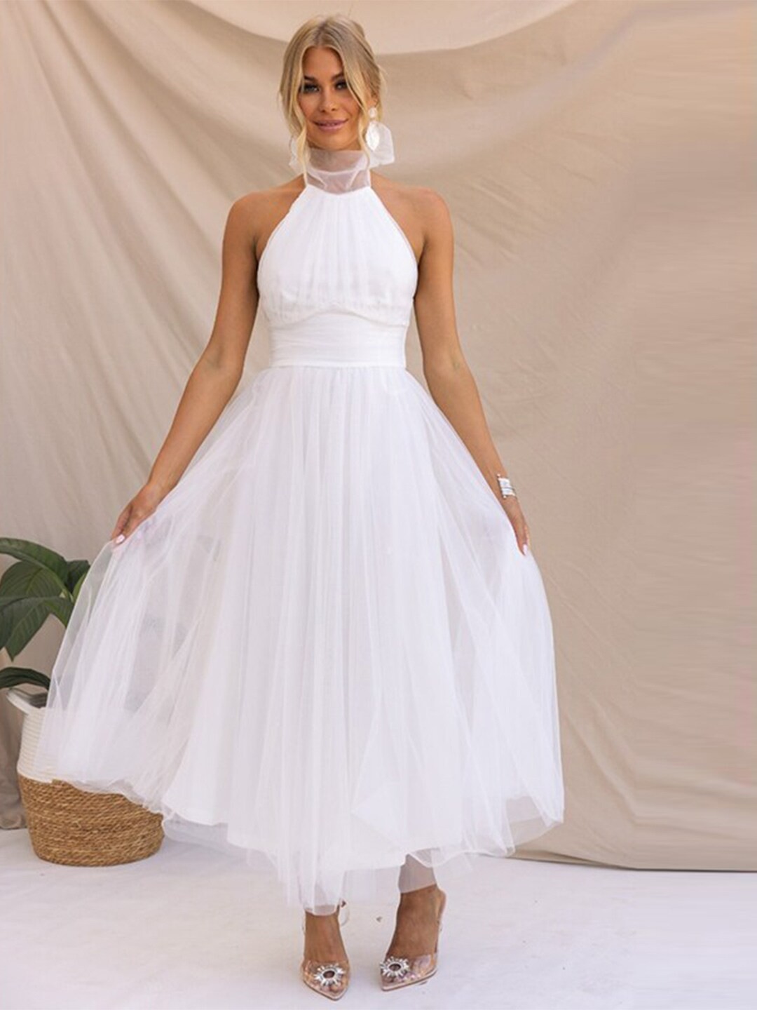 

StyleCast x Revolte White Halter Neck Sleeveless Fit & Flare Midi Dress