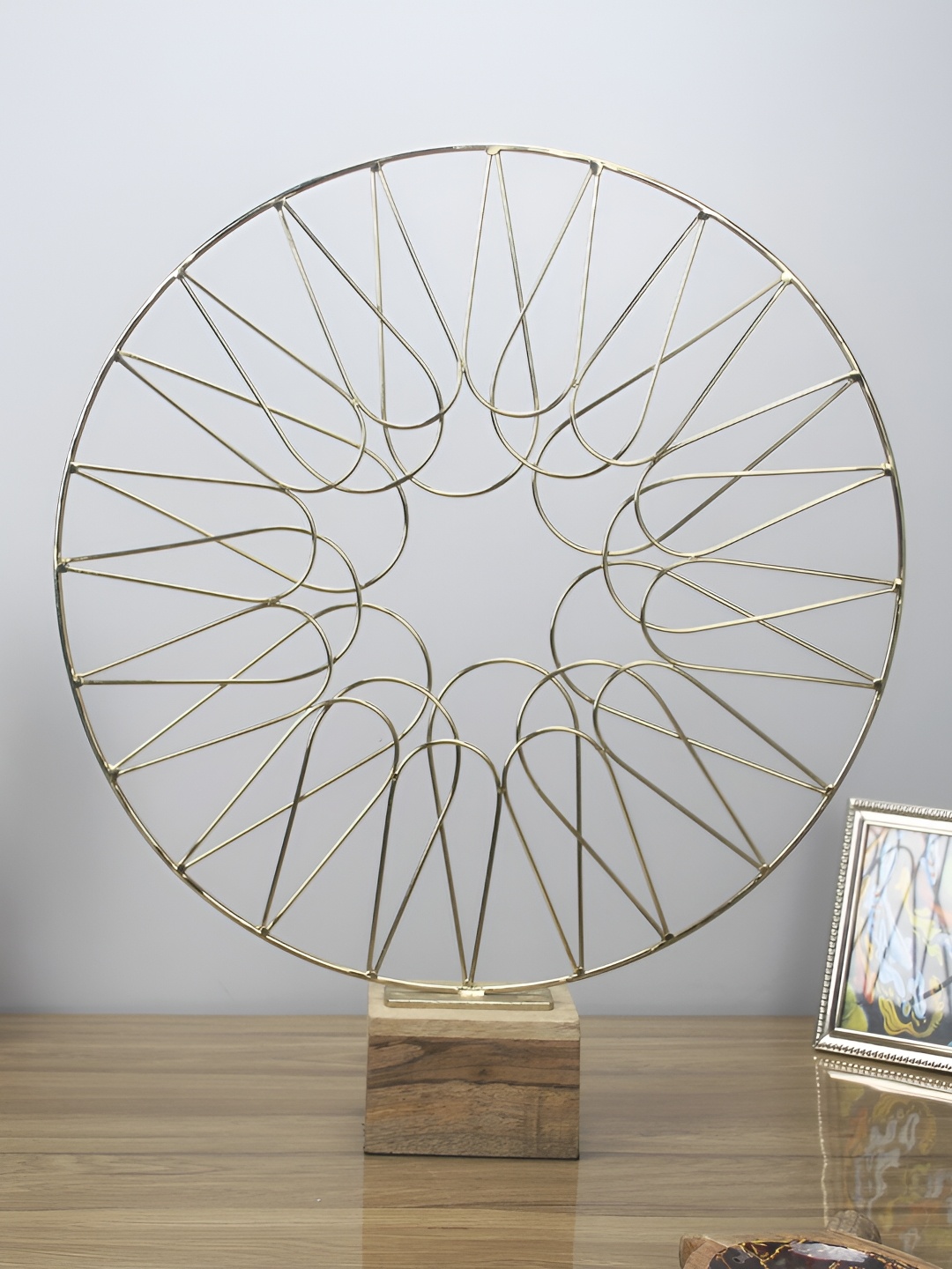 

Maison Modern Gold-Toned Extra Large Geometric Wheel Metal Figurine Showpiece