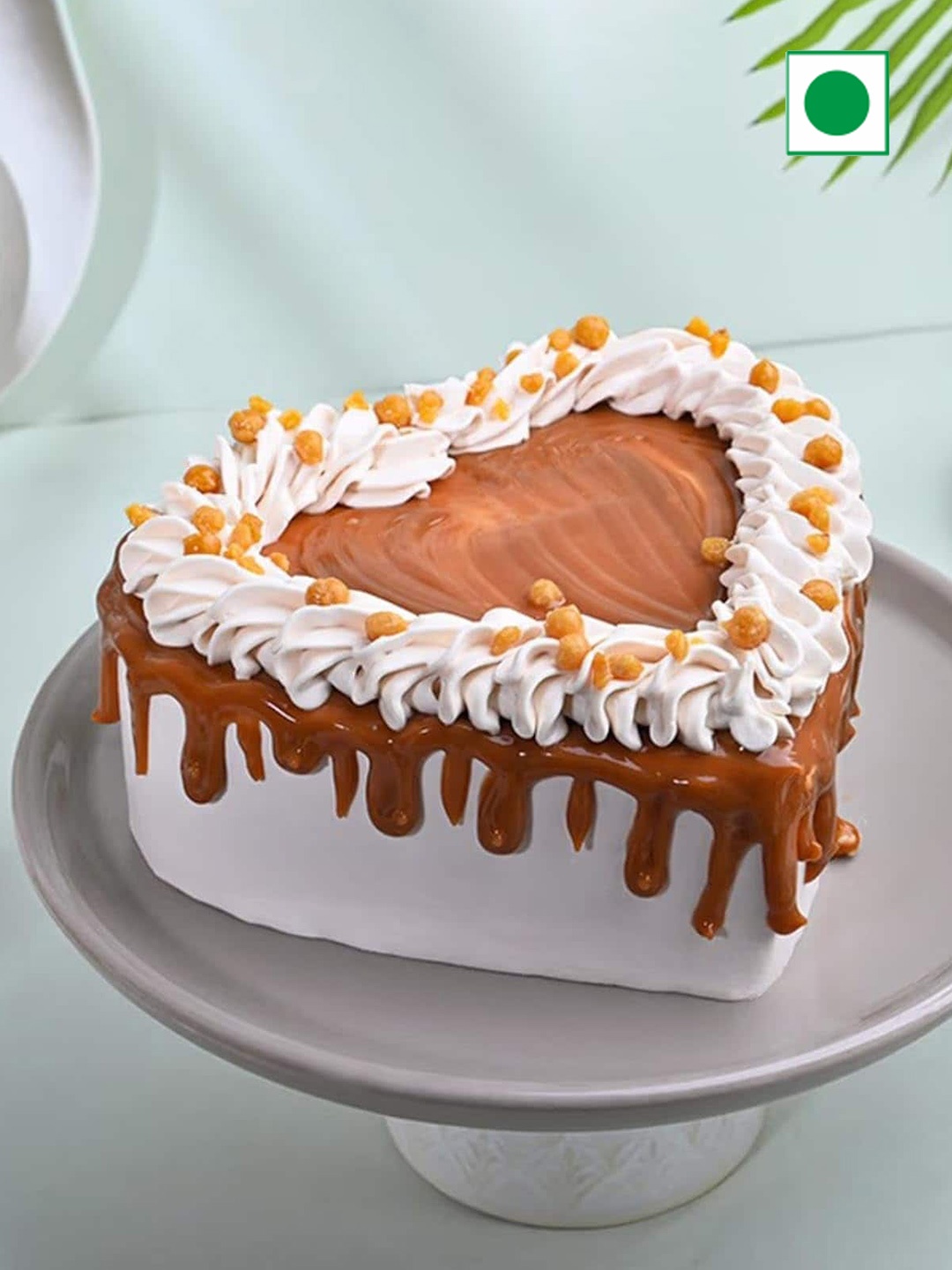 

Floweraura Butterscotch Flavour Eggless Heart Cake 500g, White