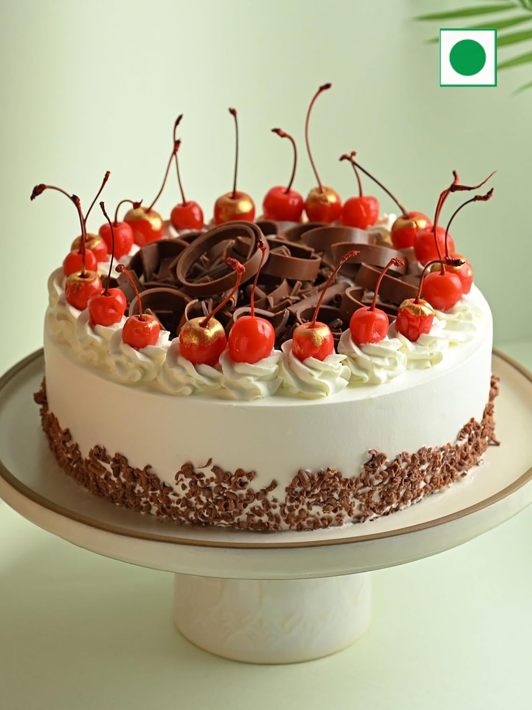 

Floweraura Cherry Topped Black Forest Flavour Eggless Round Cake- 3Kg, White