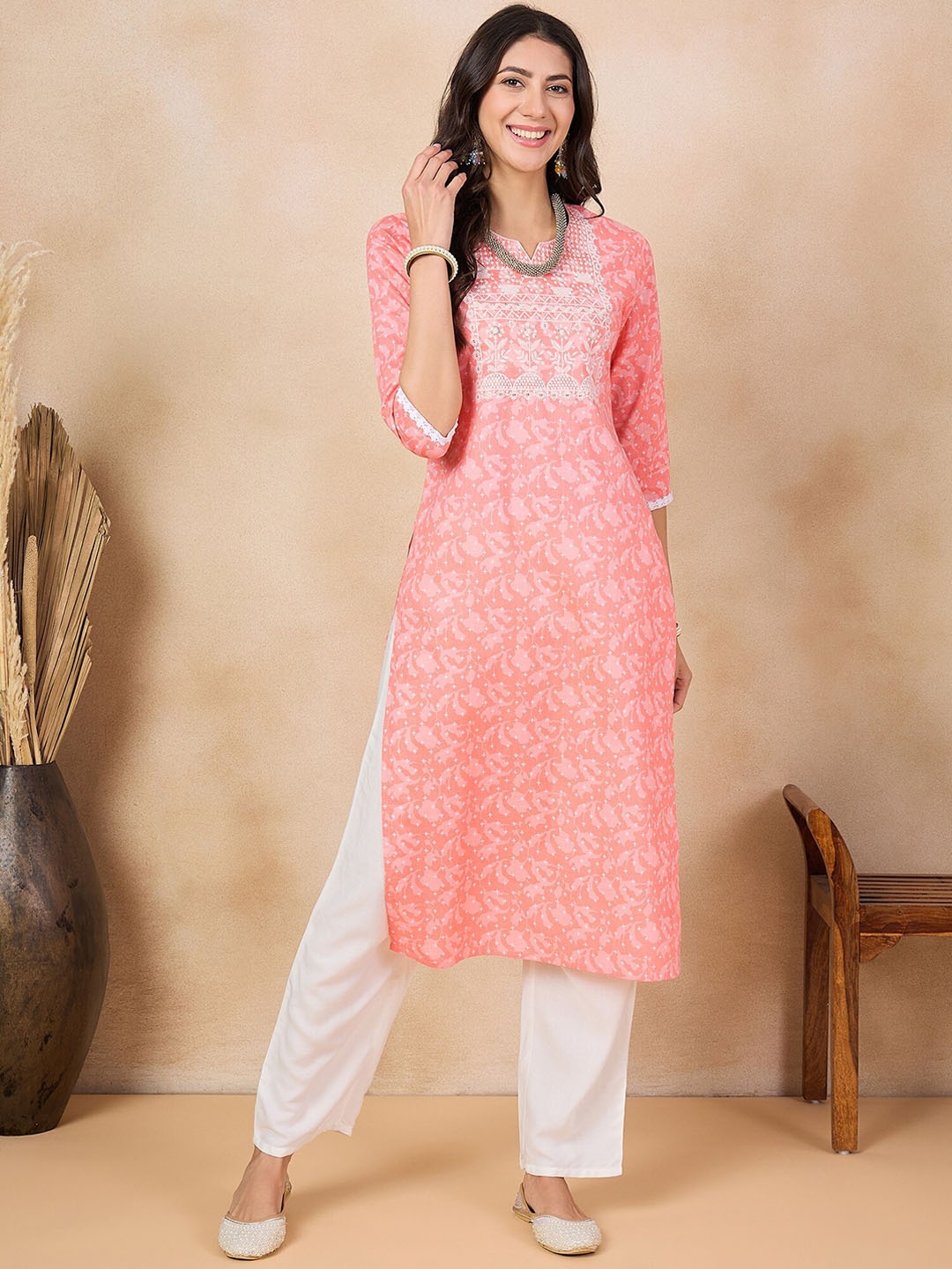 

Anouk Orange Floral Printed Thread Work Straight Kurta