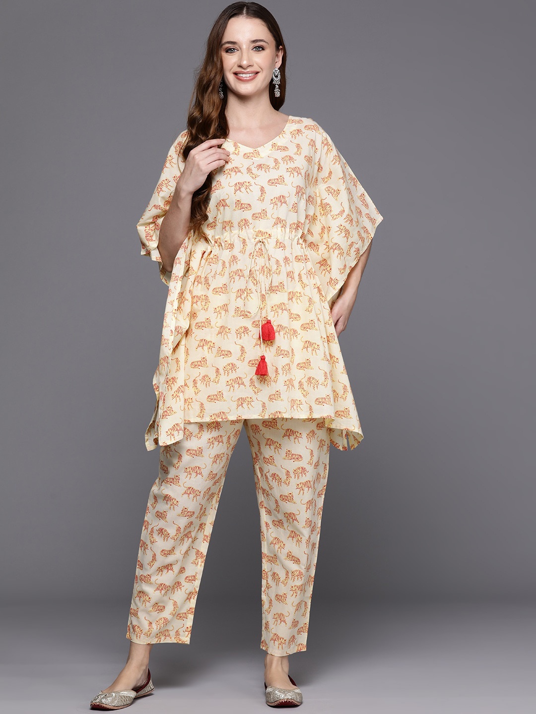 

Anouk Yellow Conversational Printed Tie-Up Neck Kaftan Pure Cotton Top With Trousers