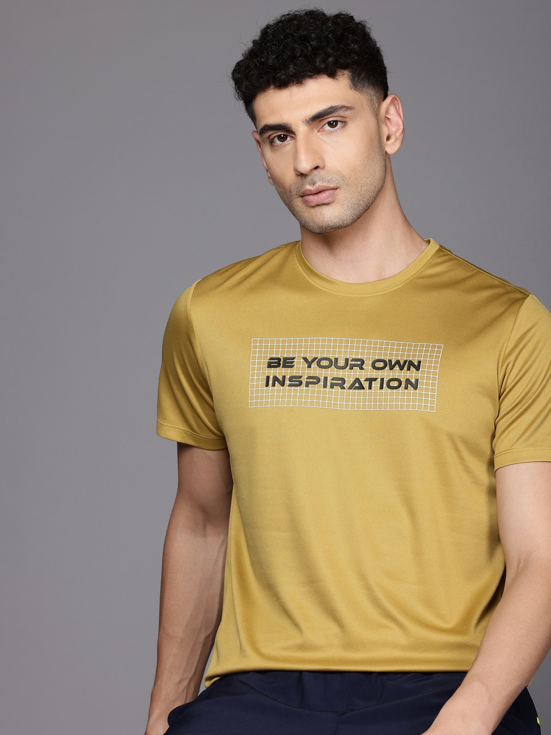 

HRX by Hrithik Roshan Men Typography Training T-shirt, Mustard