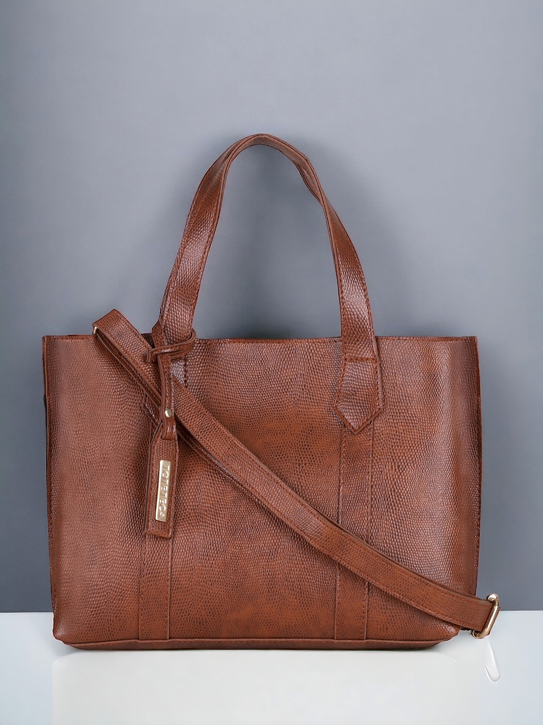 

Toteteca Textured Oversized Structured Handheld Bag, Tan