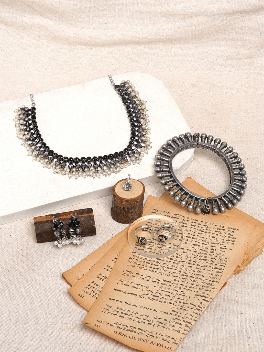 

TEEJH Silver-Plated Anantapur Oxidised Stone Studded & Beaded Jewellery Set