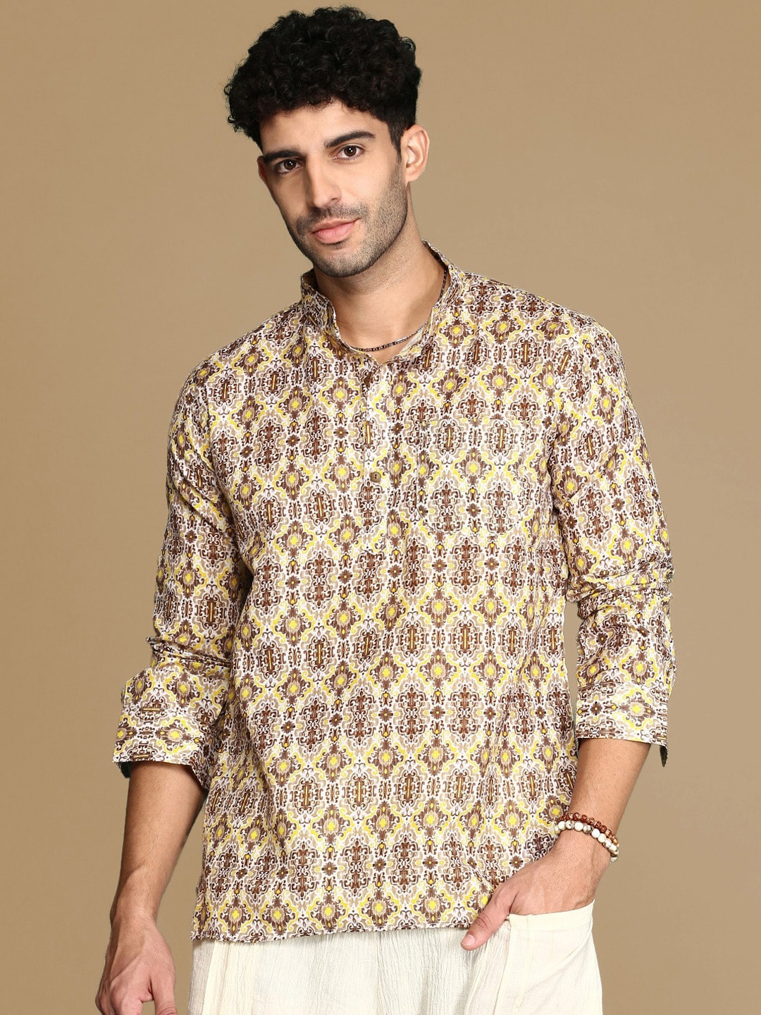 

Sanwara Ethnic Motifs Printed Mandarin Collar Short Kurta, Yellow