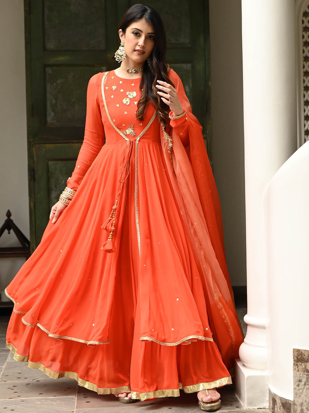 

Urbanstree Round Neck Floral Embroidered Regular Sequinned Kurta with Skirt & With Dupatta, Orange