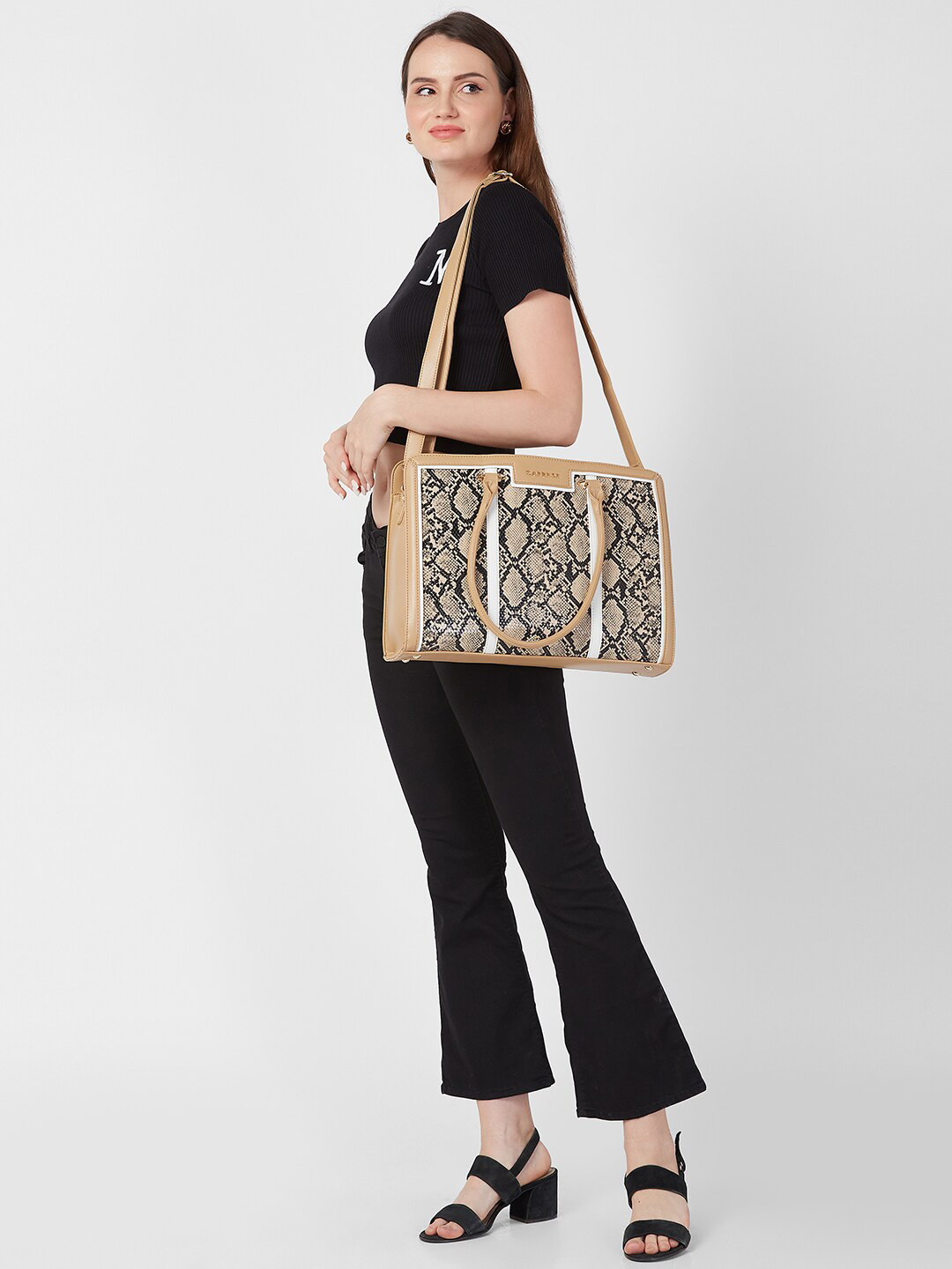 

Caprese Women Animal Textured Up to 14 inch Laptop Bag, Brown