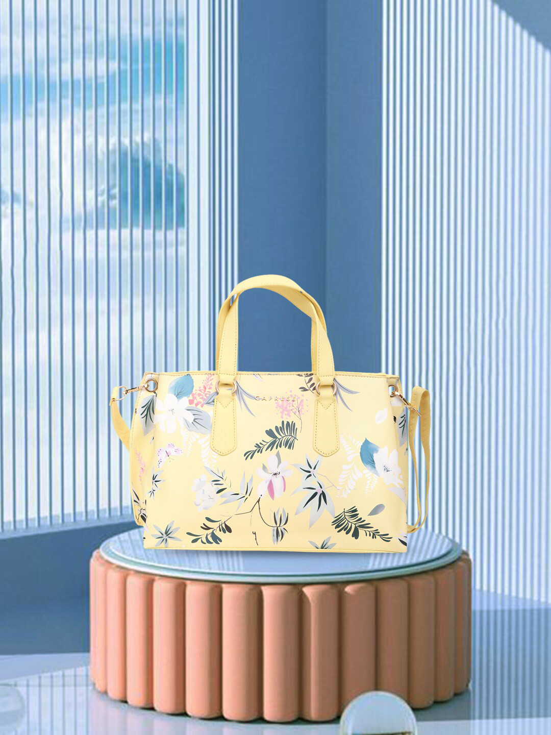 

Caprese Floral Printed PU Structured Handheld Bag, Yellow
