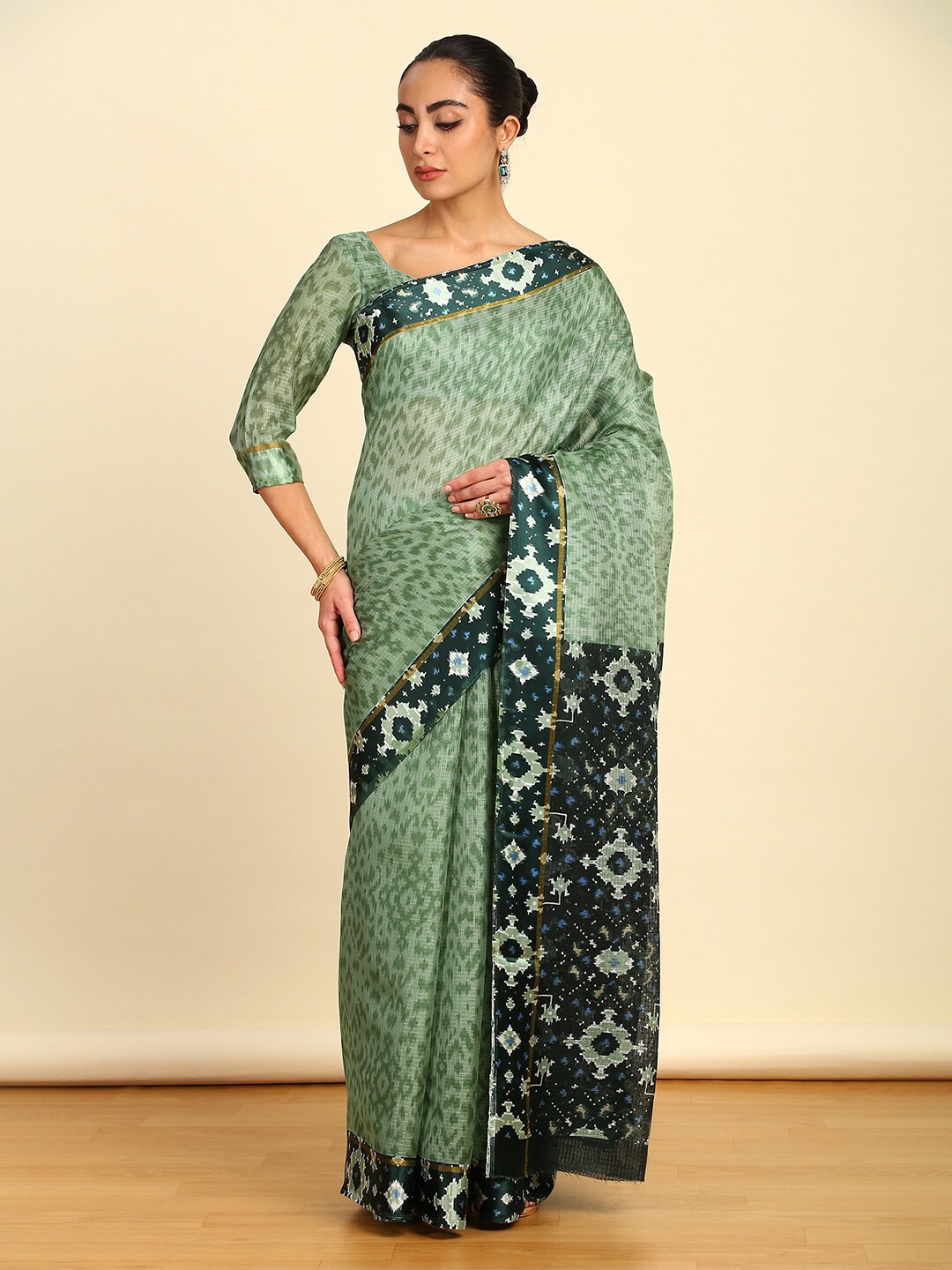 

Soch Green Ethnic Motifs Printed Pure Cotton Ikat Saree