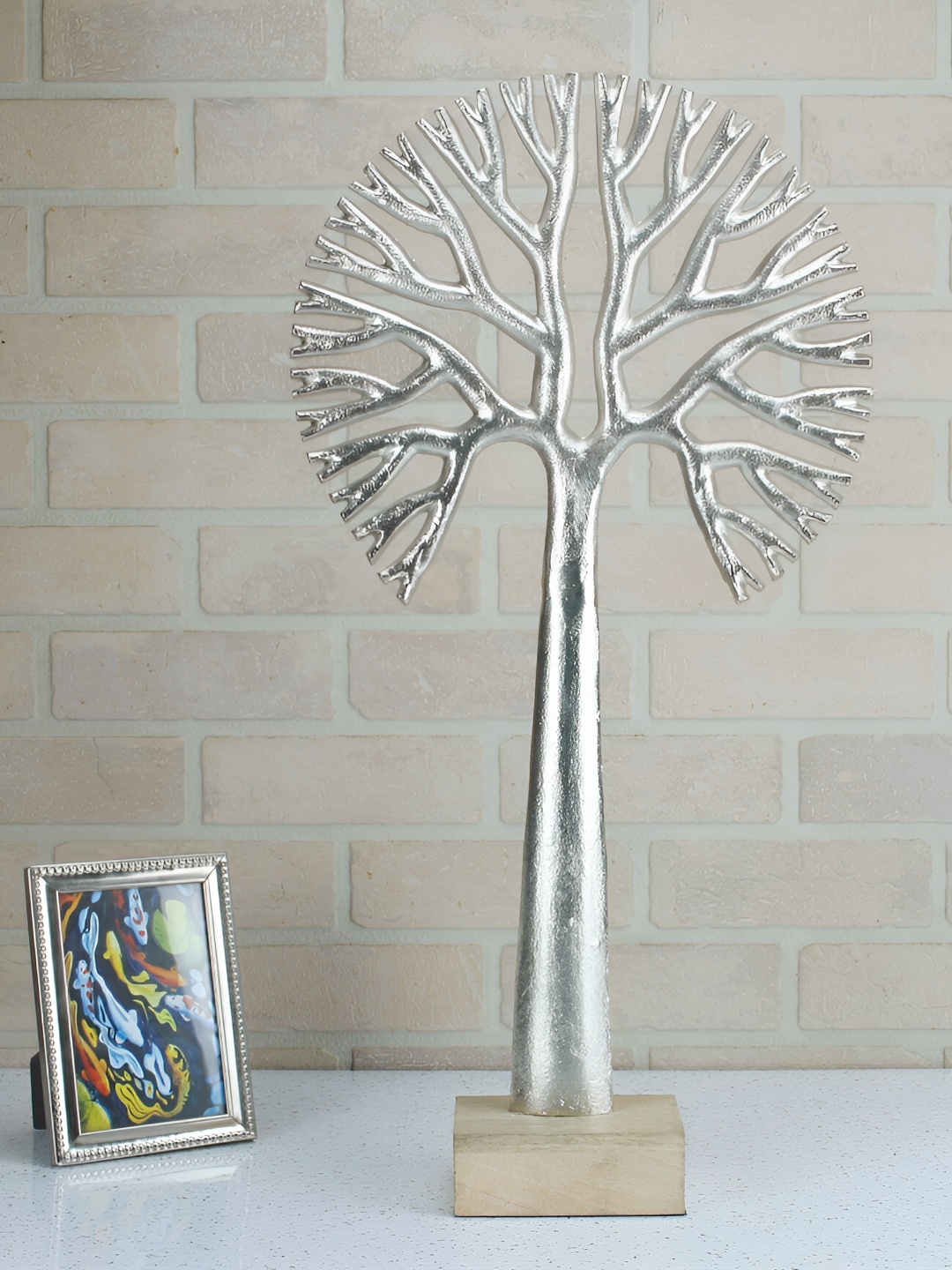

Maison Modern Silver-Toned Textured Curio Showpiece