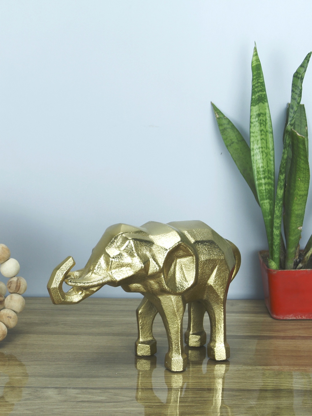 

Maison Modern Gold-Toned Textured Curio Showpiece