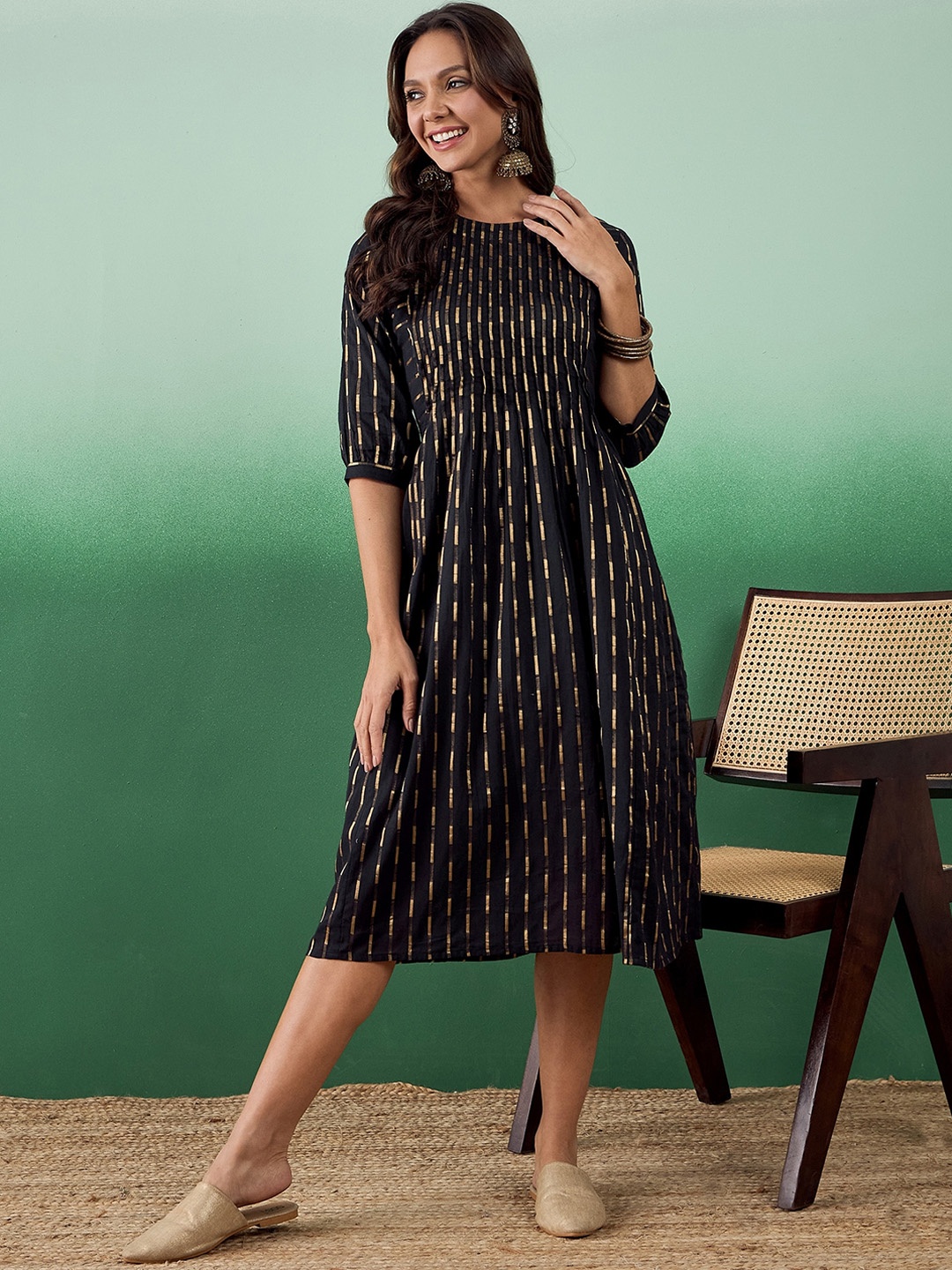 

Sangria Abstract Printed Tasselled Pure Cotton Fit & Flare Ethnic Dress, Black