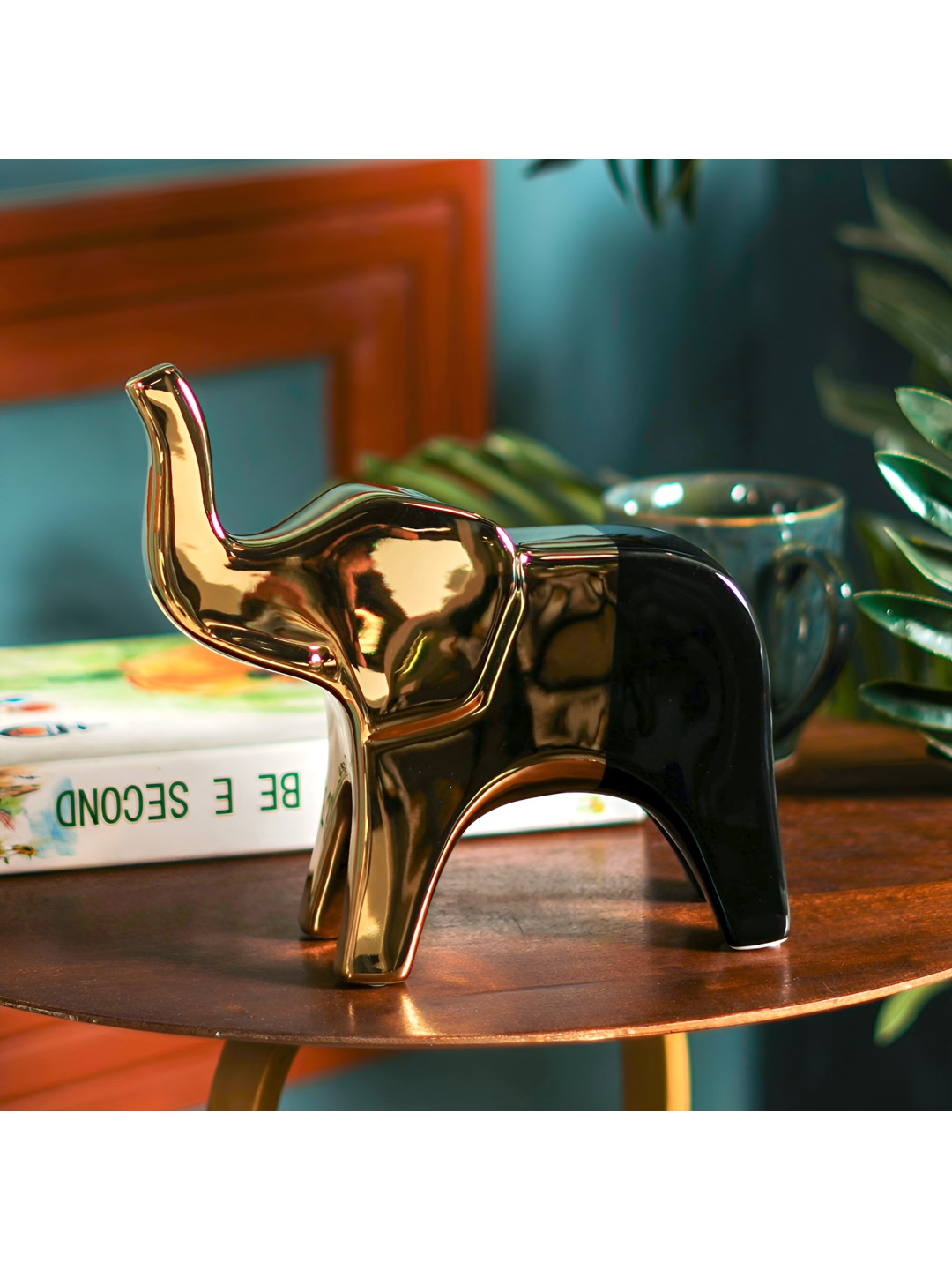 

THE ARTMENT Gold Toned & Black Nordic Elegance Gold Elephant Sculpture Figurine Showpiece