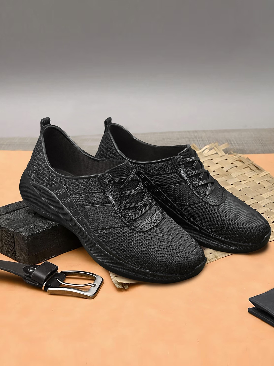 

Ajanta Men Textured Waterproof Lightweight Slip On Sneakers, Black