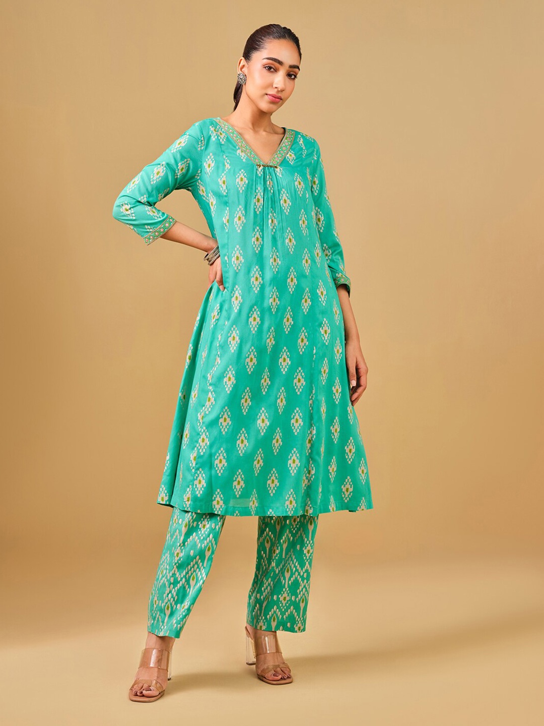 

Global Desi Women Ethnic Motifs Printed Pleated with Sequinned Kurta & Trouser, Sea green