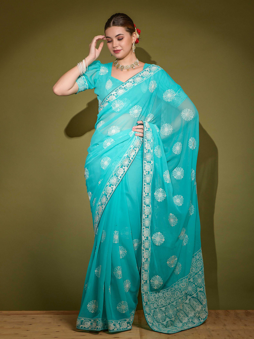 

Mitera Blue Ethnic Embroidered Saree