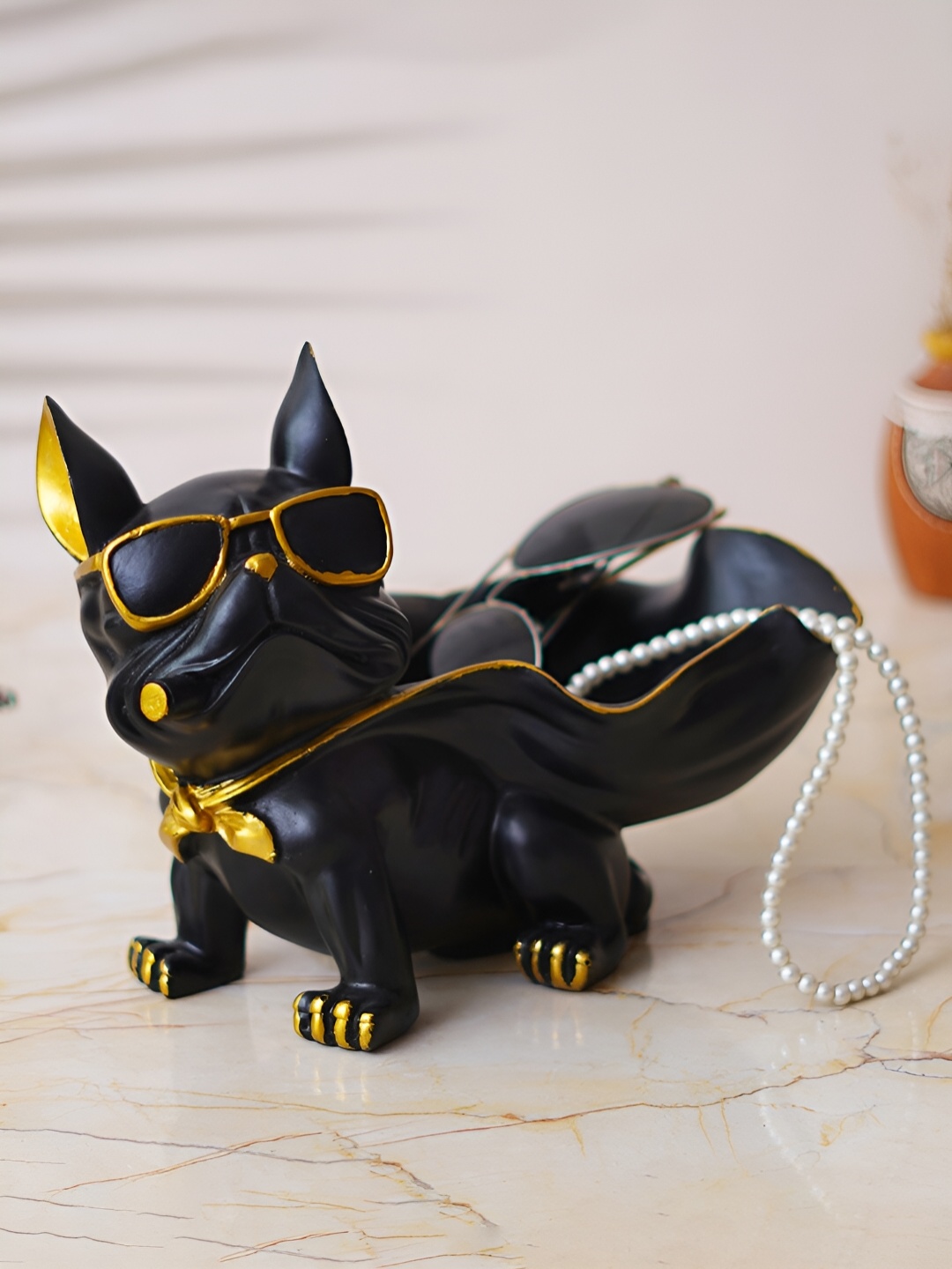 

eCraftIndia Black & Gold toned Figurine Showpiece