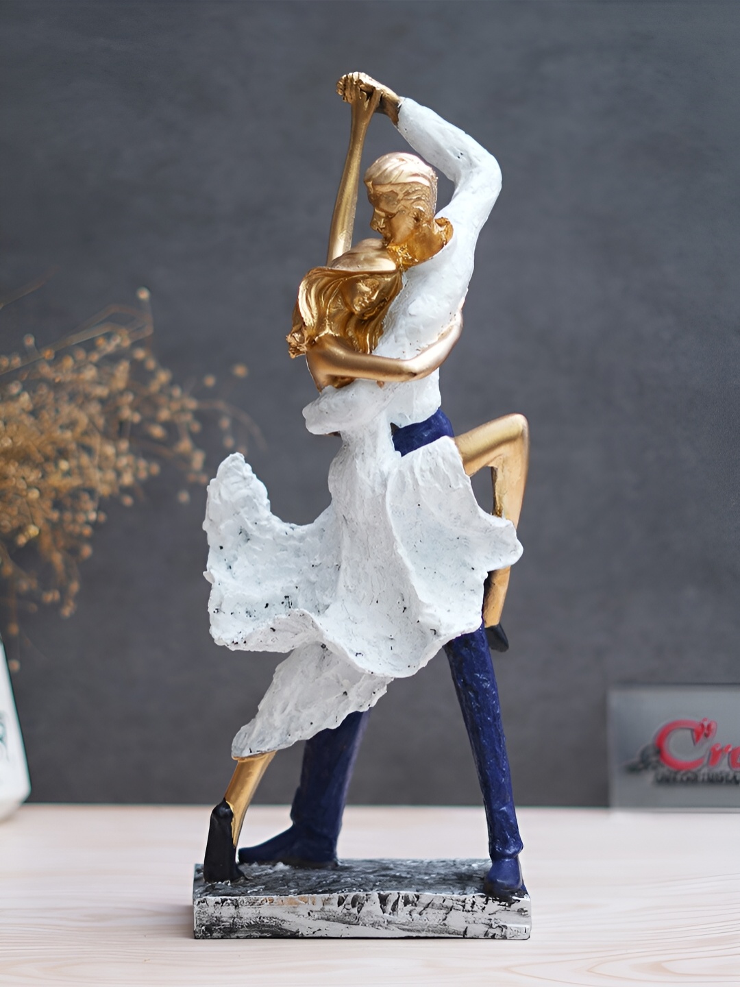

eCraftIndia White & Beige Figurine Showpiece