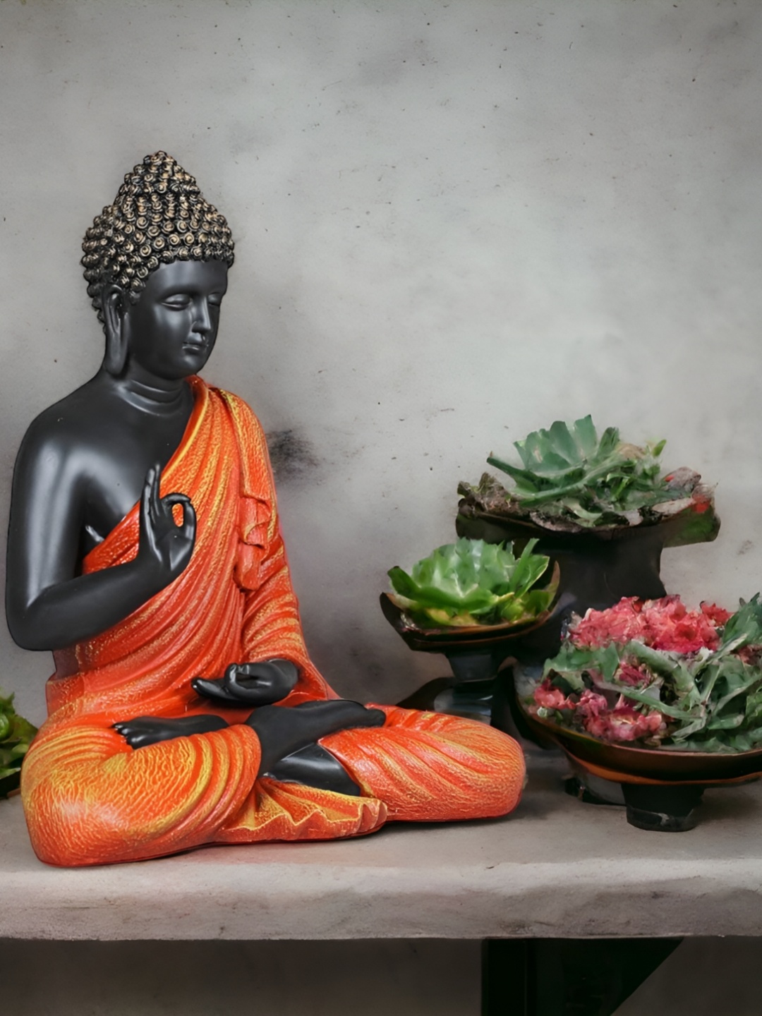 

SANKALAN CREATIONS Black & Orange Buddha Idol Showpiece