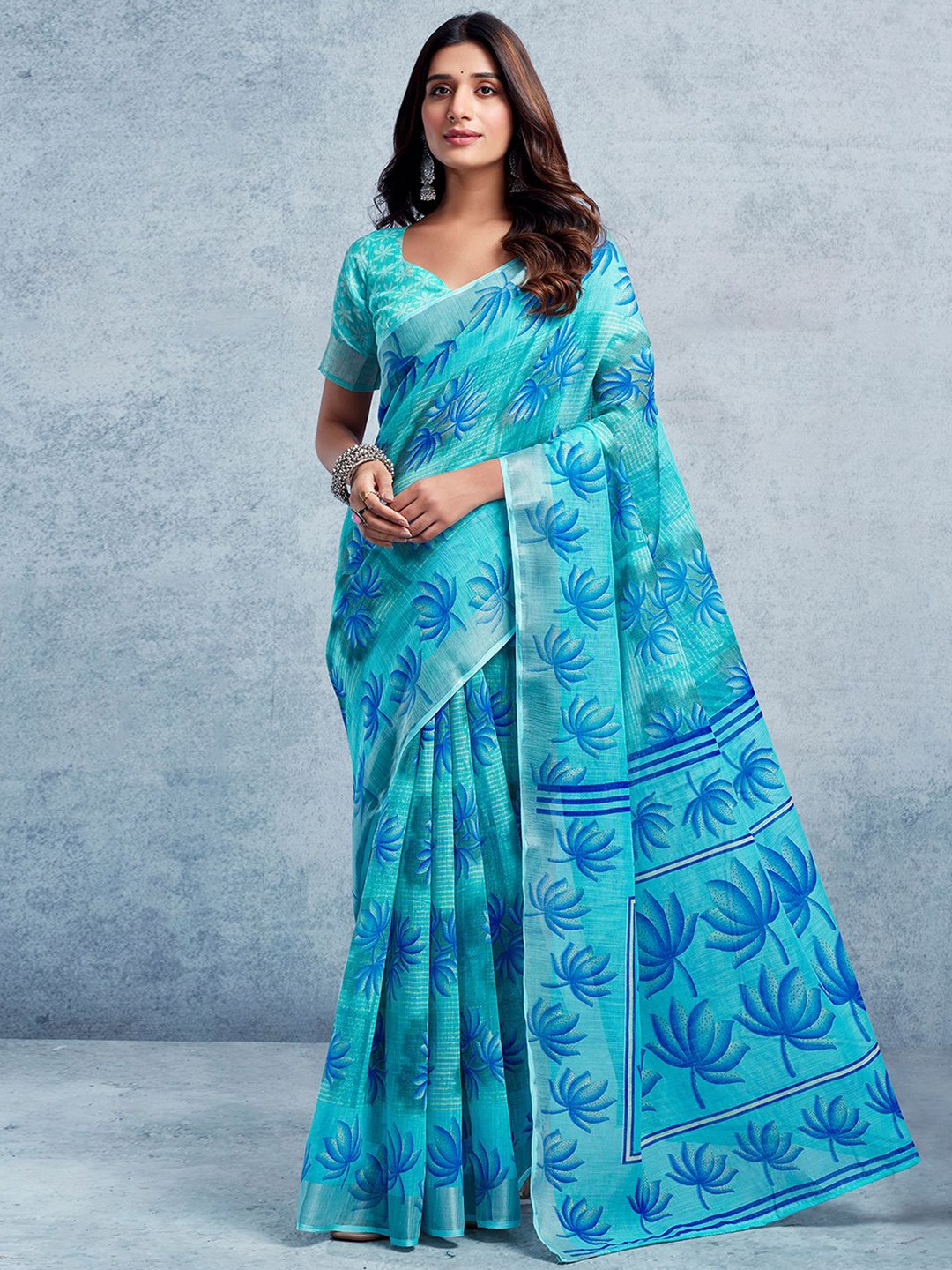 

KALINI Floral Printed Zari Ikat Saree, Turquoise blue