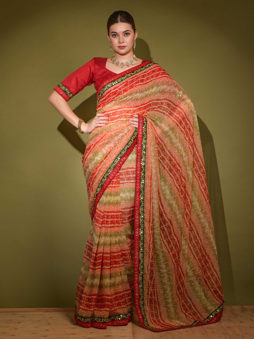 

Mitera Red Ethnic Motifs Printed Embroidered Saree