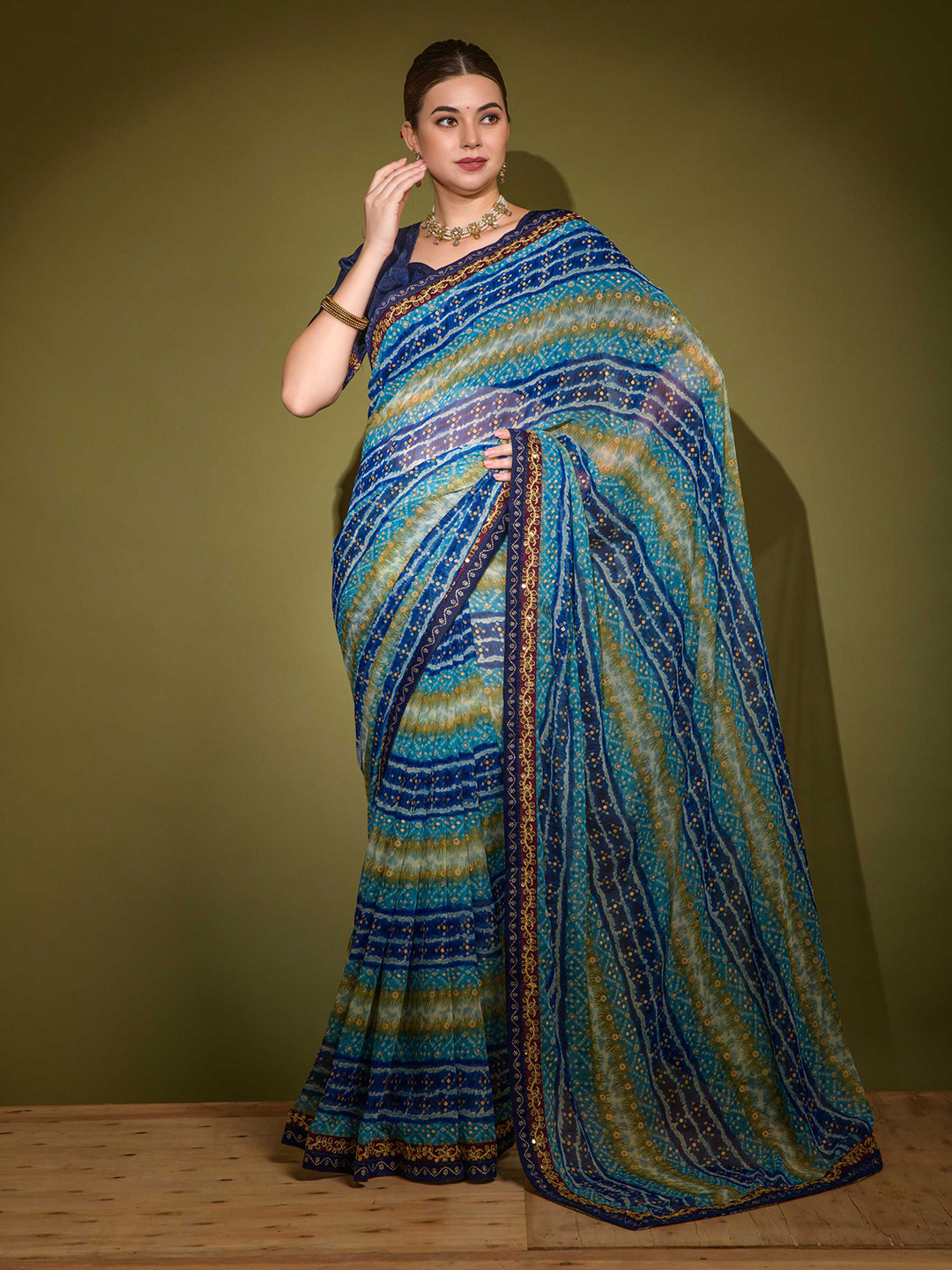 

Mitera Ethnic Motifs Printed Embroidered Saree, Blue