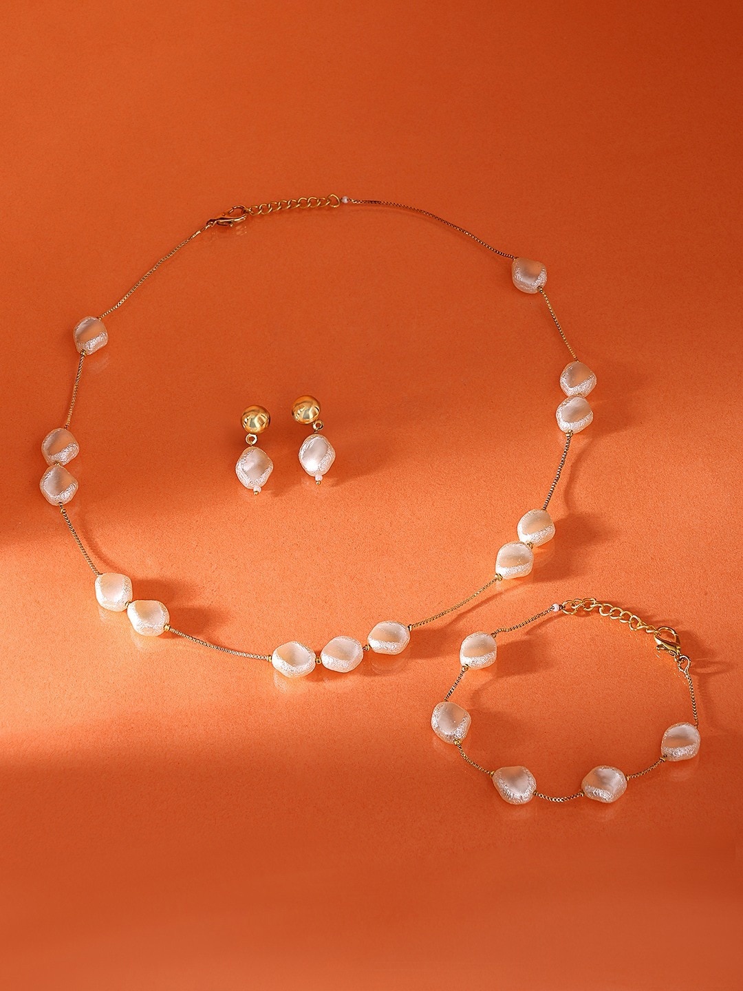 

AMI Gold Plated Beads Embellished Jewellery Set