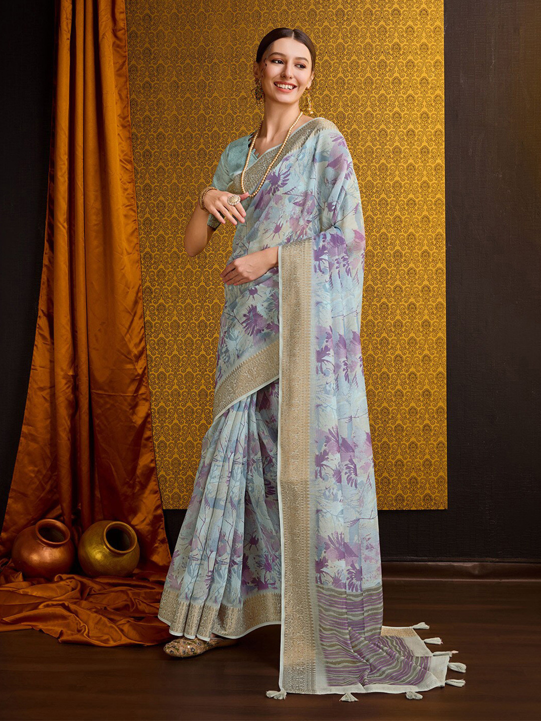 

Ishin Sea Green Floral Printed Zari Saree