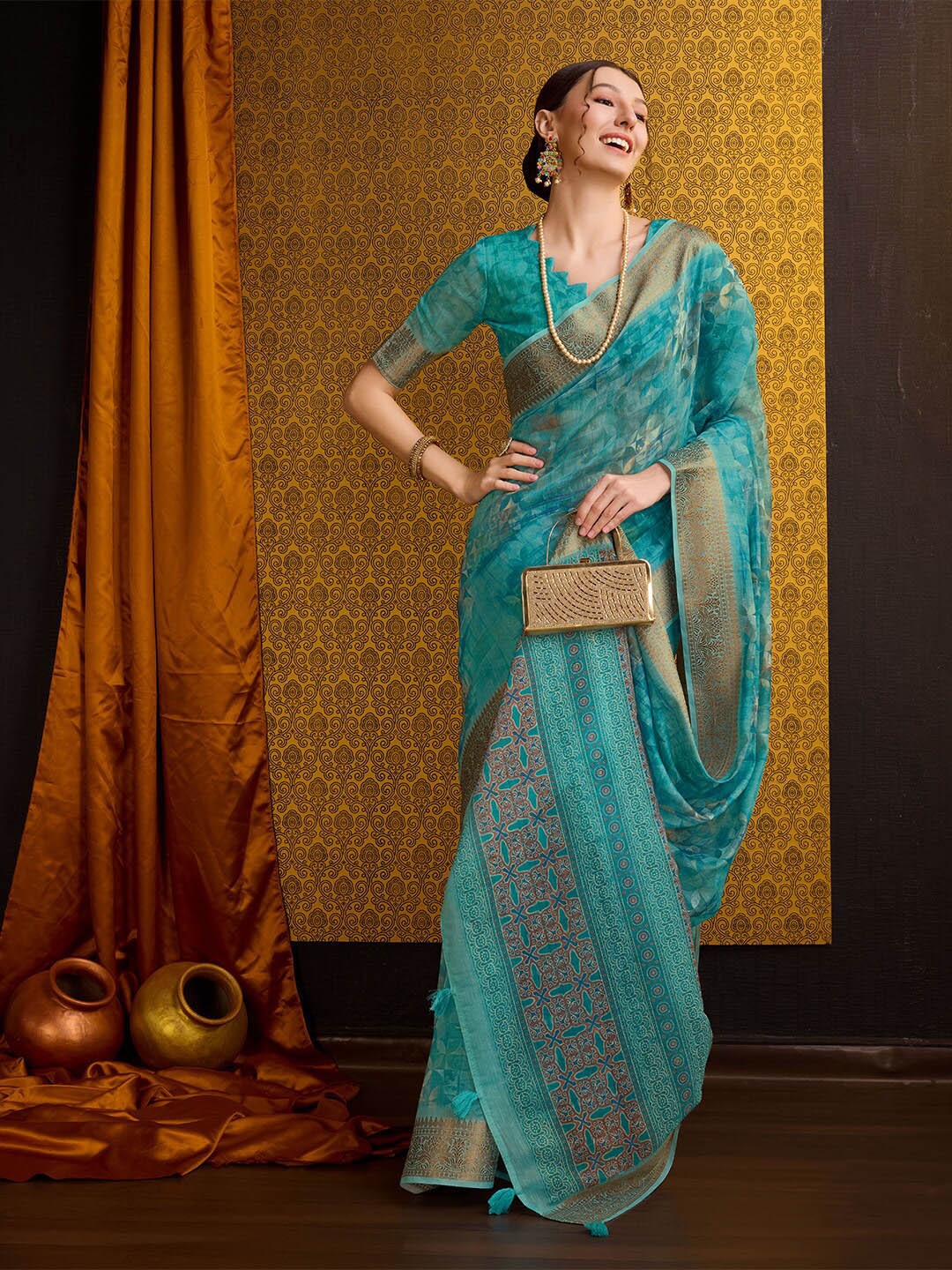 

Ishin Sea Green Floral Printed Zari Saree