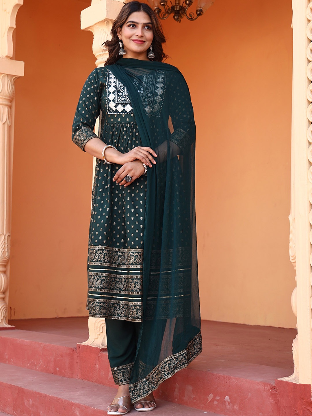 

Misti Exim Ethnic Motifs Printed Empire Mirror Work Kurta with Trousers & With Dupatta, Green