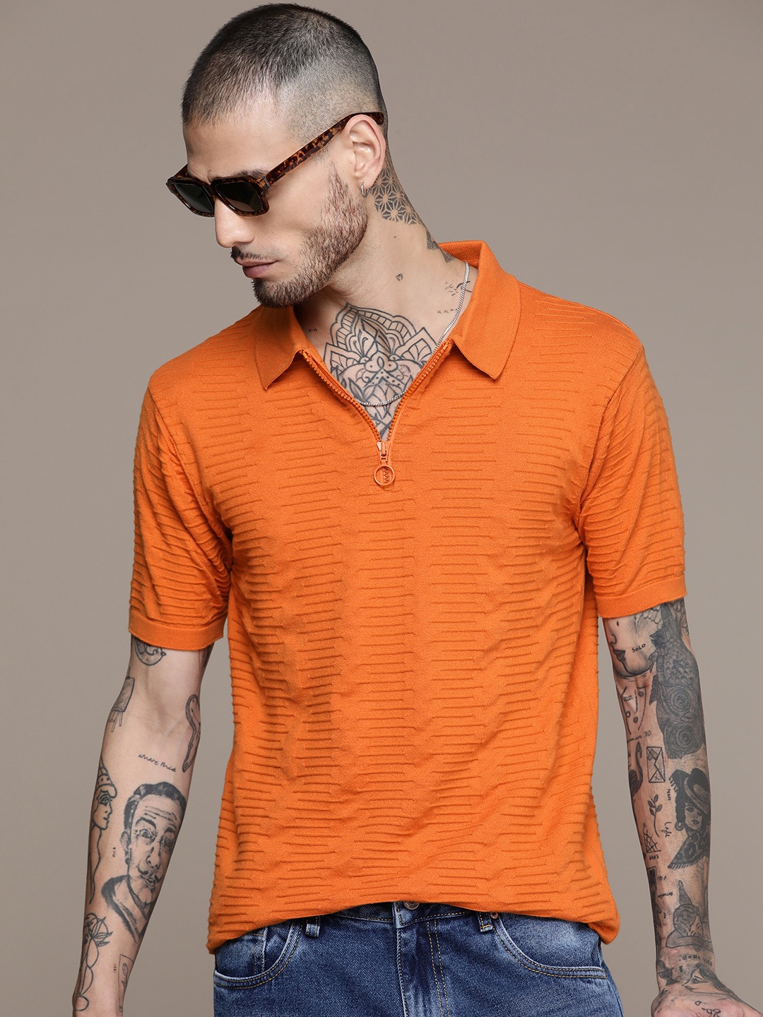 

Roadster Men Self Design Polo Collar T-shirt, Orange