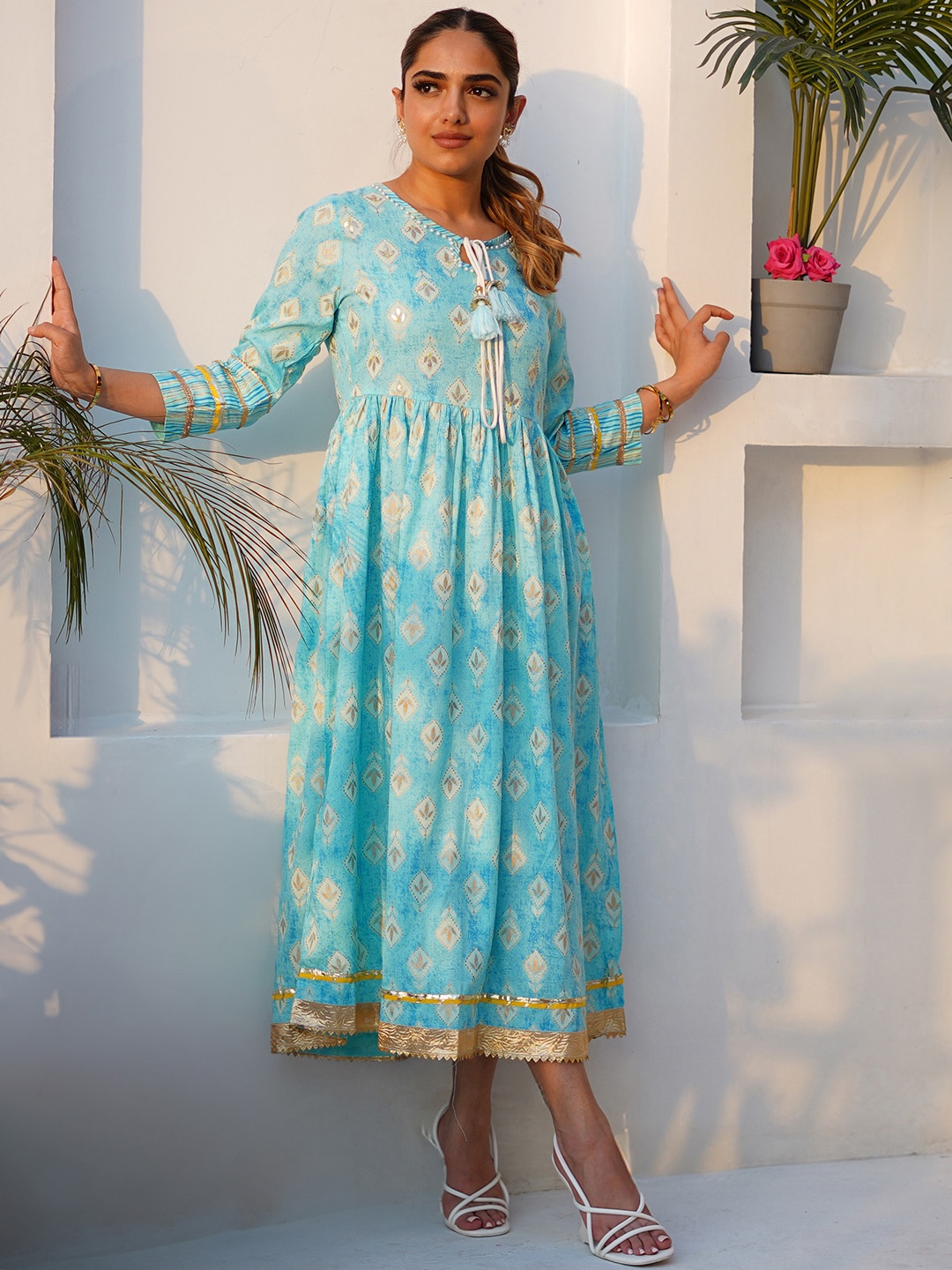 

Libas Ethnic Motifs Printed Tie-Up Neck Cotton Fit and Flare Ethnic Dress, Turquoise blue