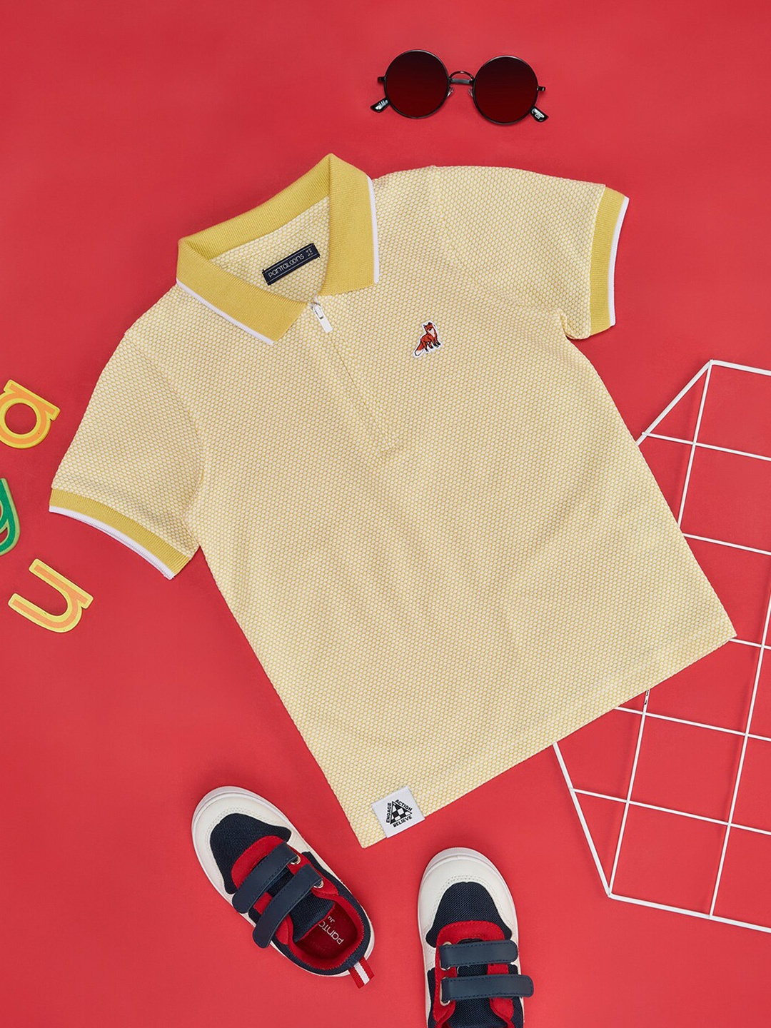

Pantaloons Junior Boys Self Design Polo Collar Cotton T-shirt, Yellow