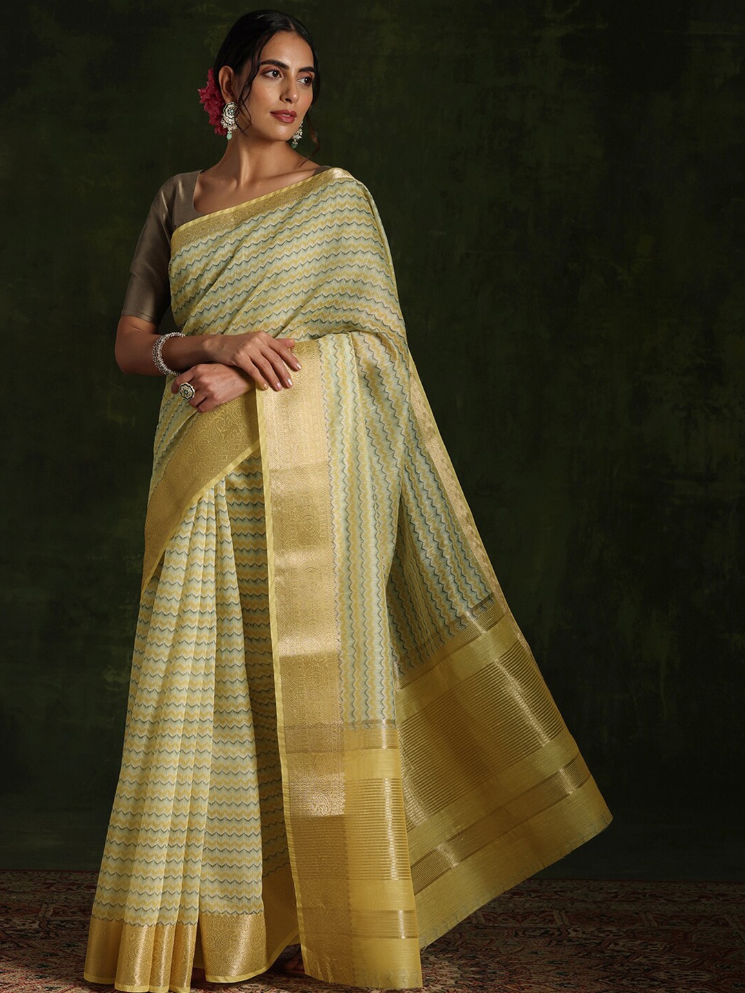 

Libas Yellow Striped Zari Chanderi Saree