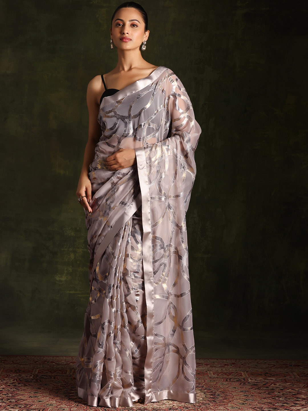 

Libas Grey Abstract Embellished Brasso Saree