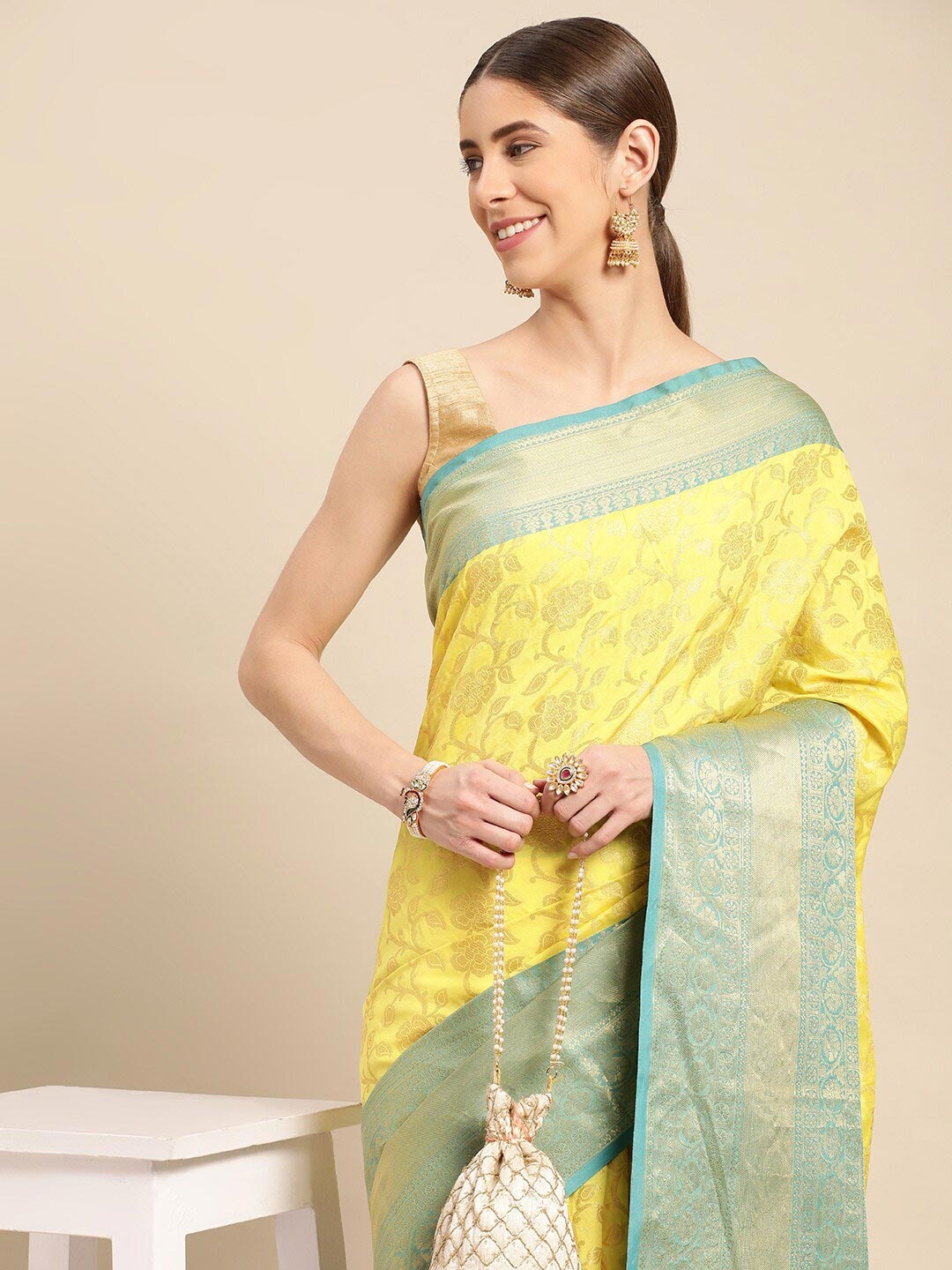 

PATLIPALLU Ethnic Motifs Woven Design Zari Banarasi Saree, Yellow