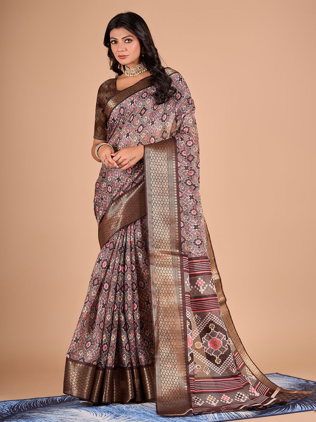 

NIRMAL CREATION Ethnic Motifs Printed Woven Design Zari Patola Saree, Coffee brown