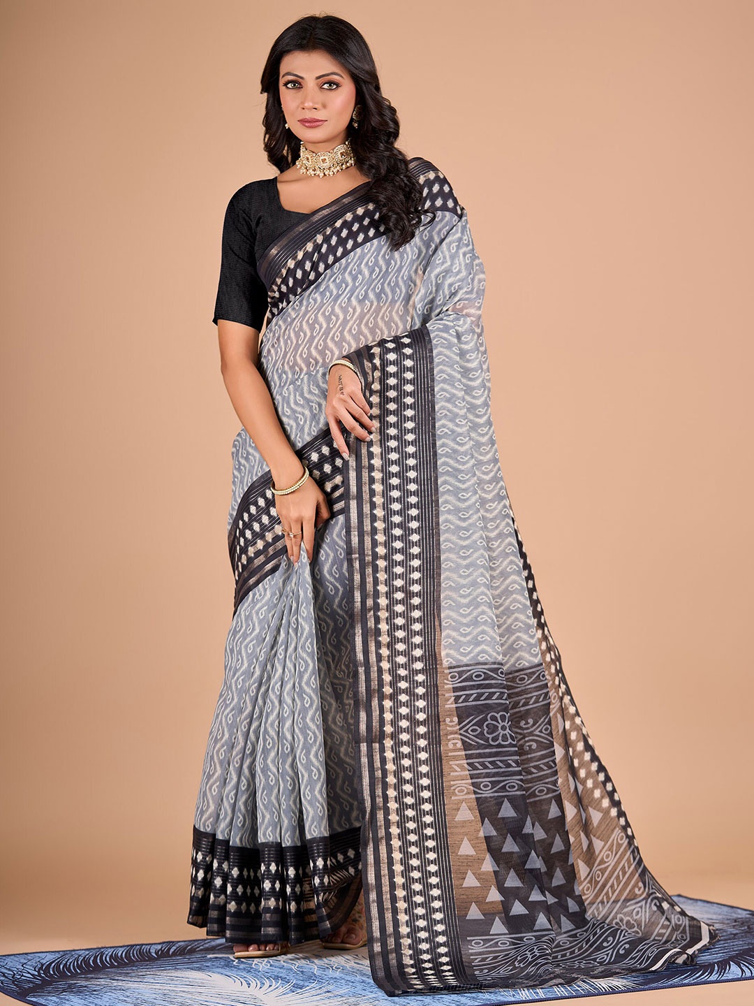 

NIRMAL CREATION Paisley Printed Zari Leheriya Saree, Grey