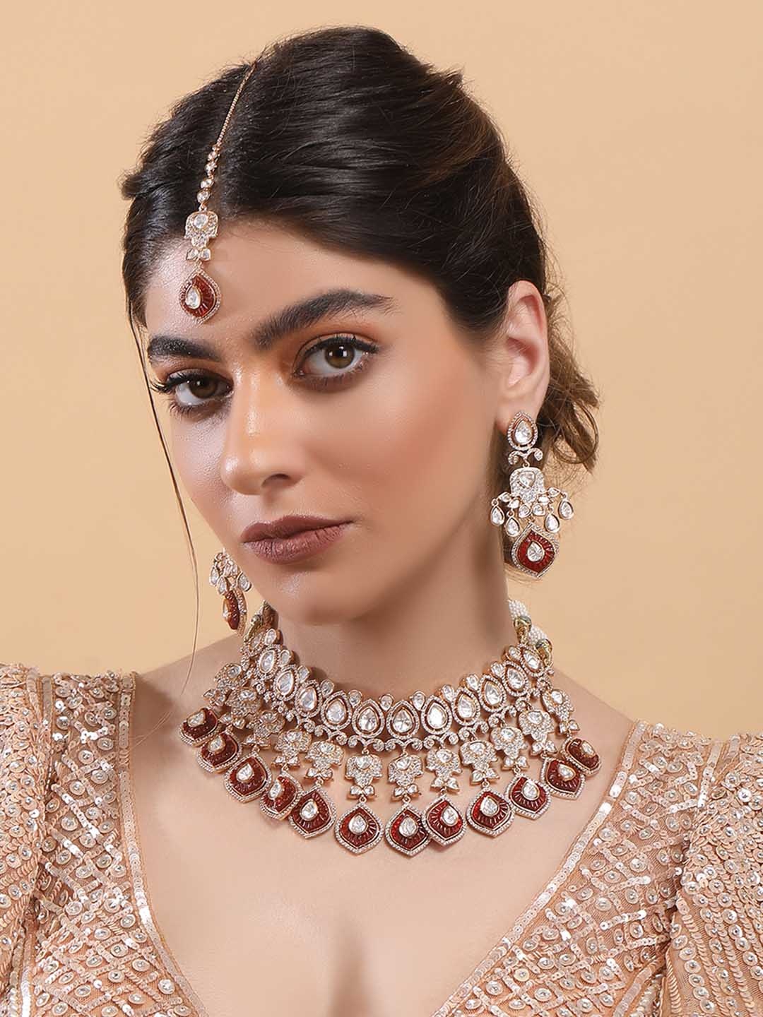 

AURAA TRENDS Gold Plated Kundan Studded & Beaded Jewellery Set