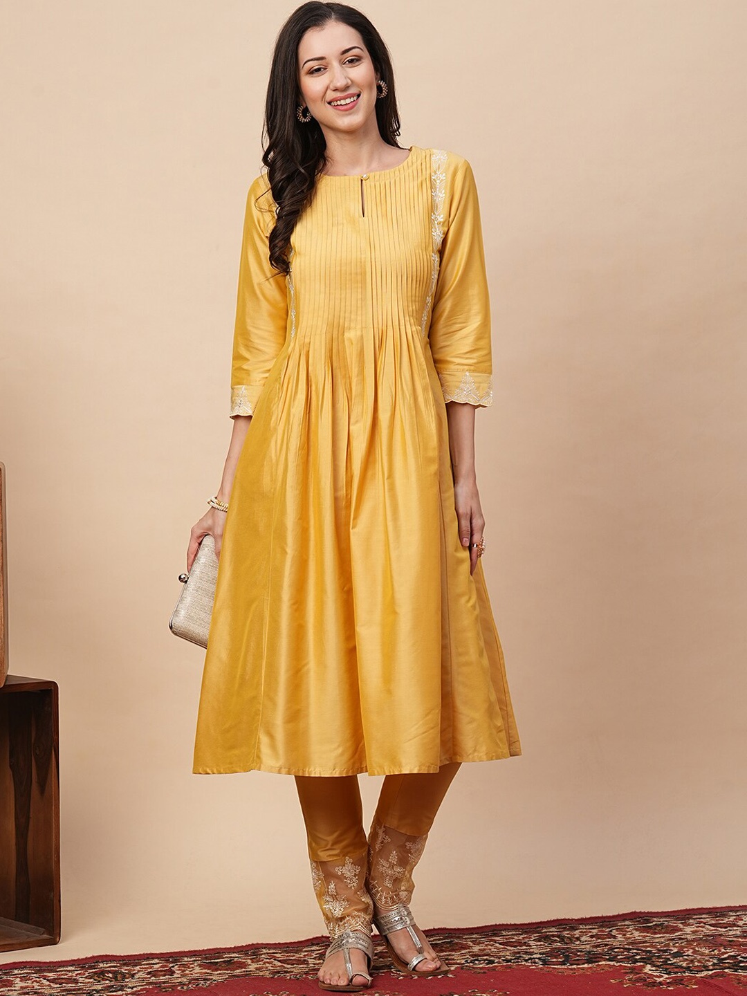 

Globus Women Keyhole Neck Pleated Thread Work Kurta With Trousers, Yellow