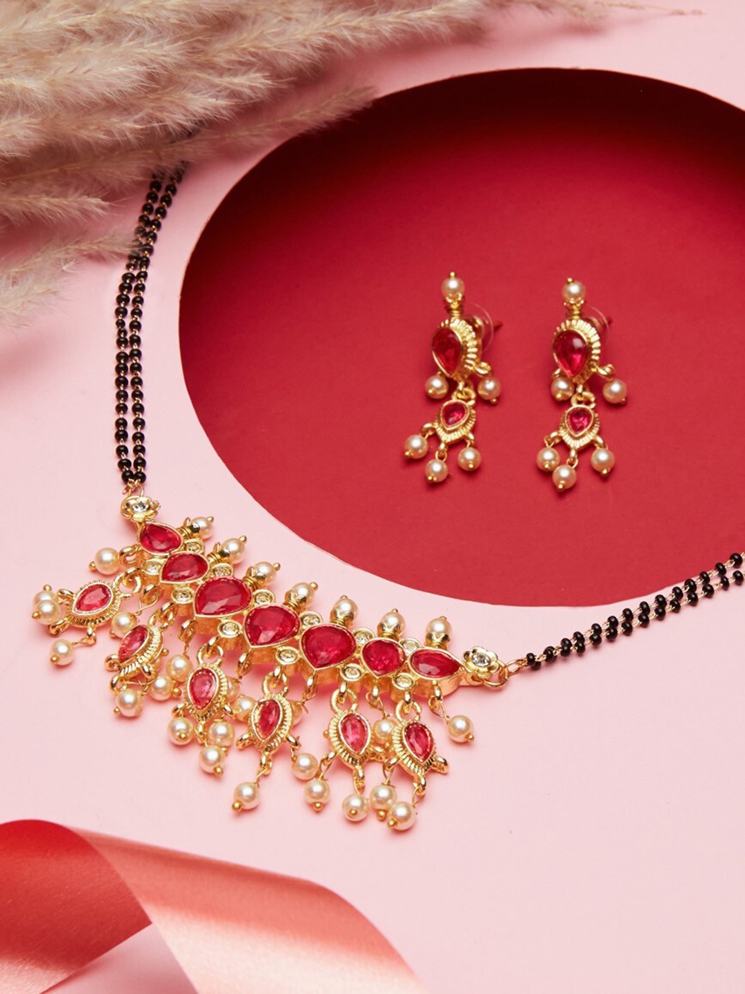 

ATIBELLE Gold-Plated Stones Studded and Beaded Floral Shaped Mangalsutra