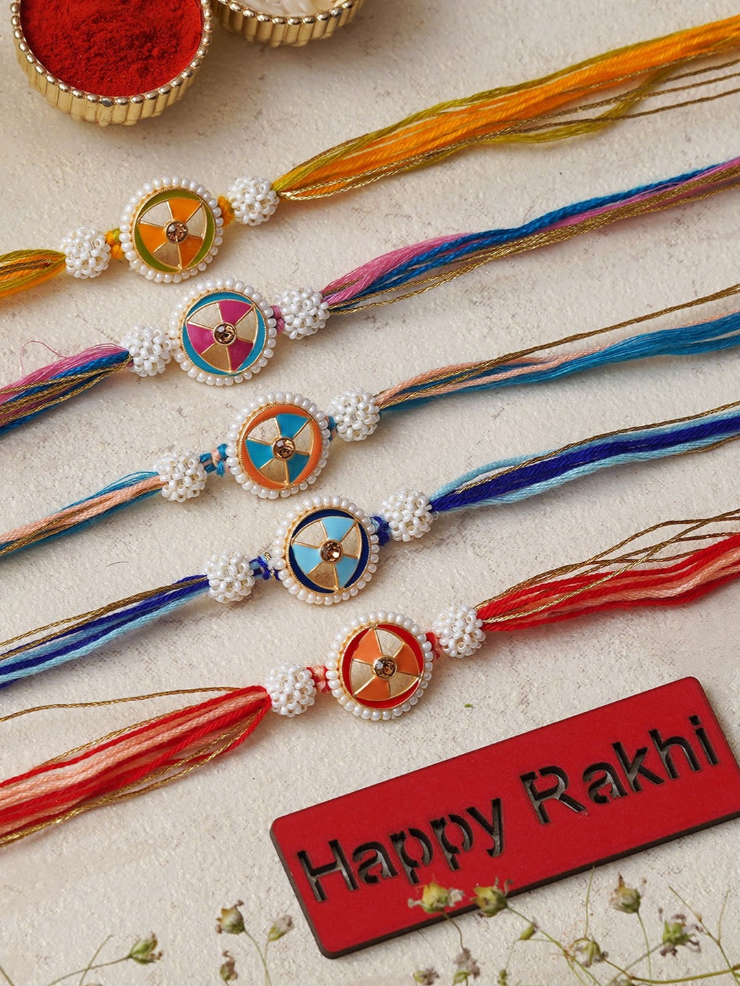 

eCraftIndia Set of 4 Kundan-Studded Designer Rakhis with Roli & Chawal, Yellow